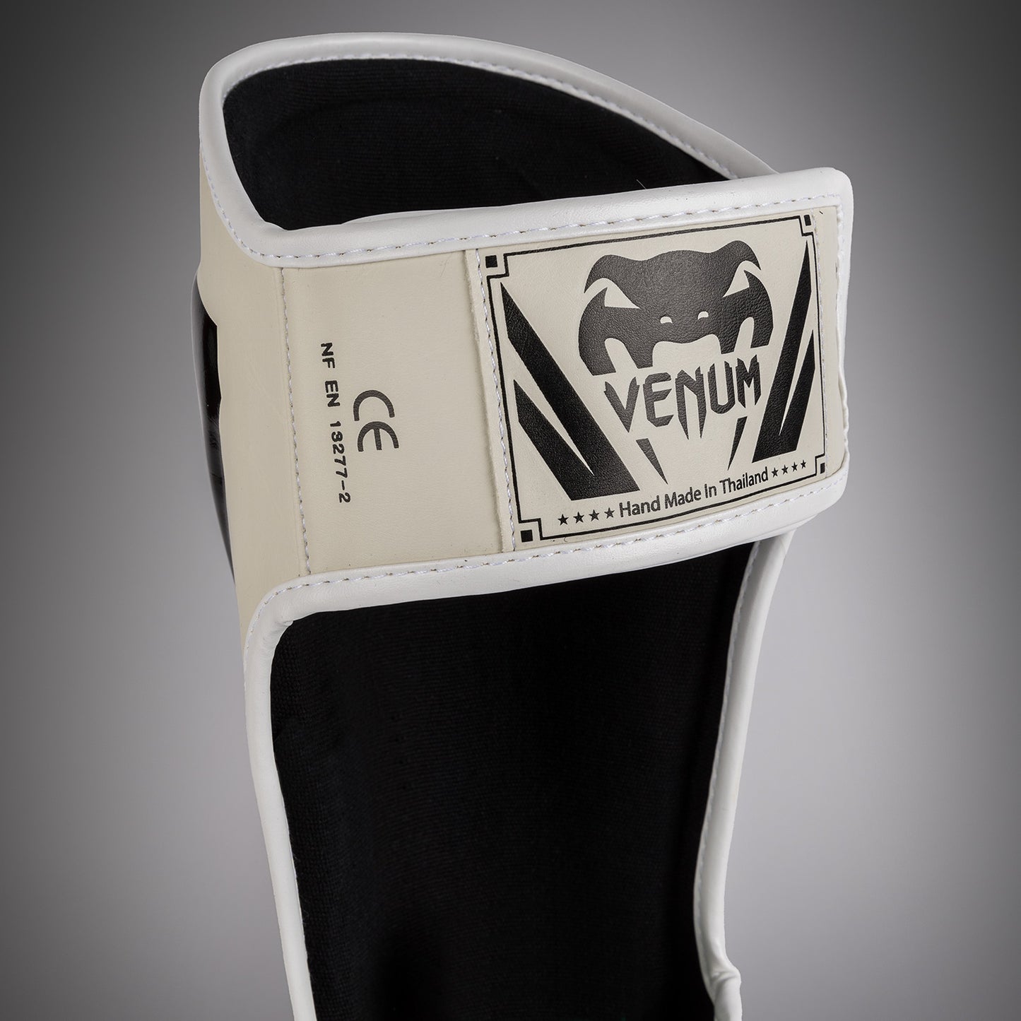 Venum Elite Parastinchi con parapiede - Bianco/Nero