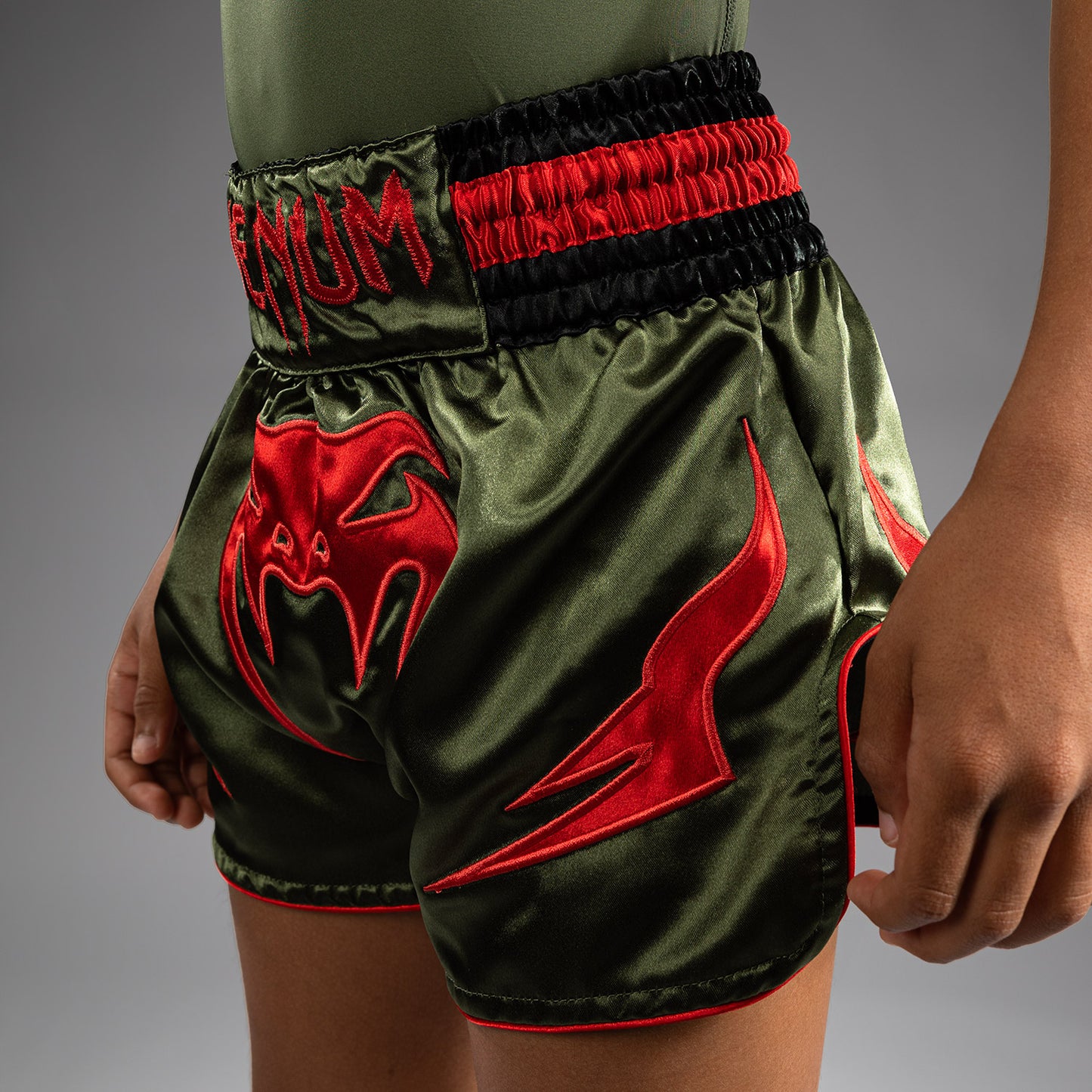 Venum Inferno Pantaloni Muay Thai per Bambini - Verde Militare/Arancione