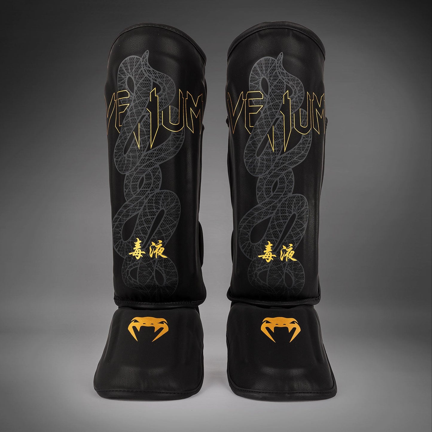 Venum Serpenti Paratibie – Nero/Argento/Oro