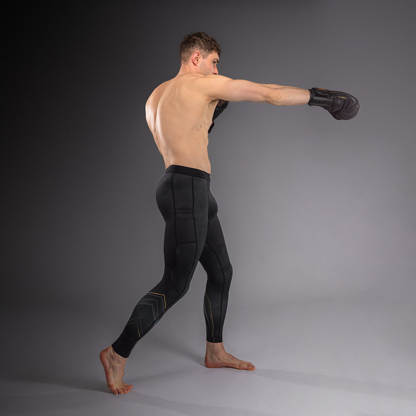 Venum Streamline Spats – Nero/Oro