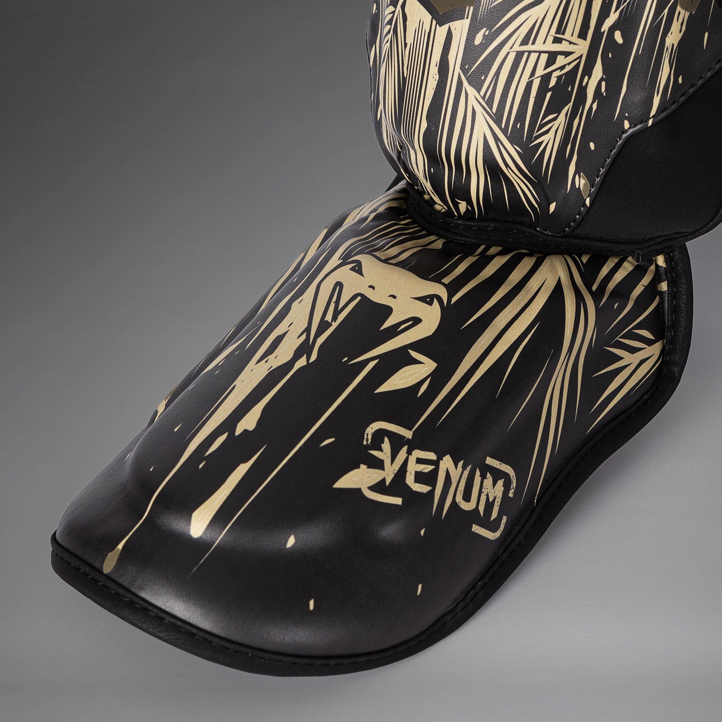 Venum Tiger Parastinchi - Nero/Arancione Neon