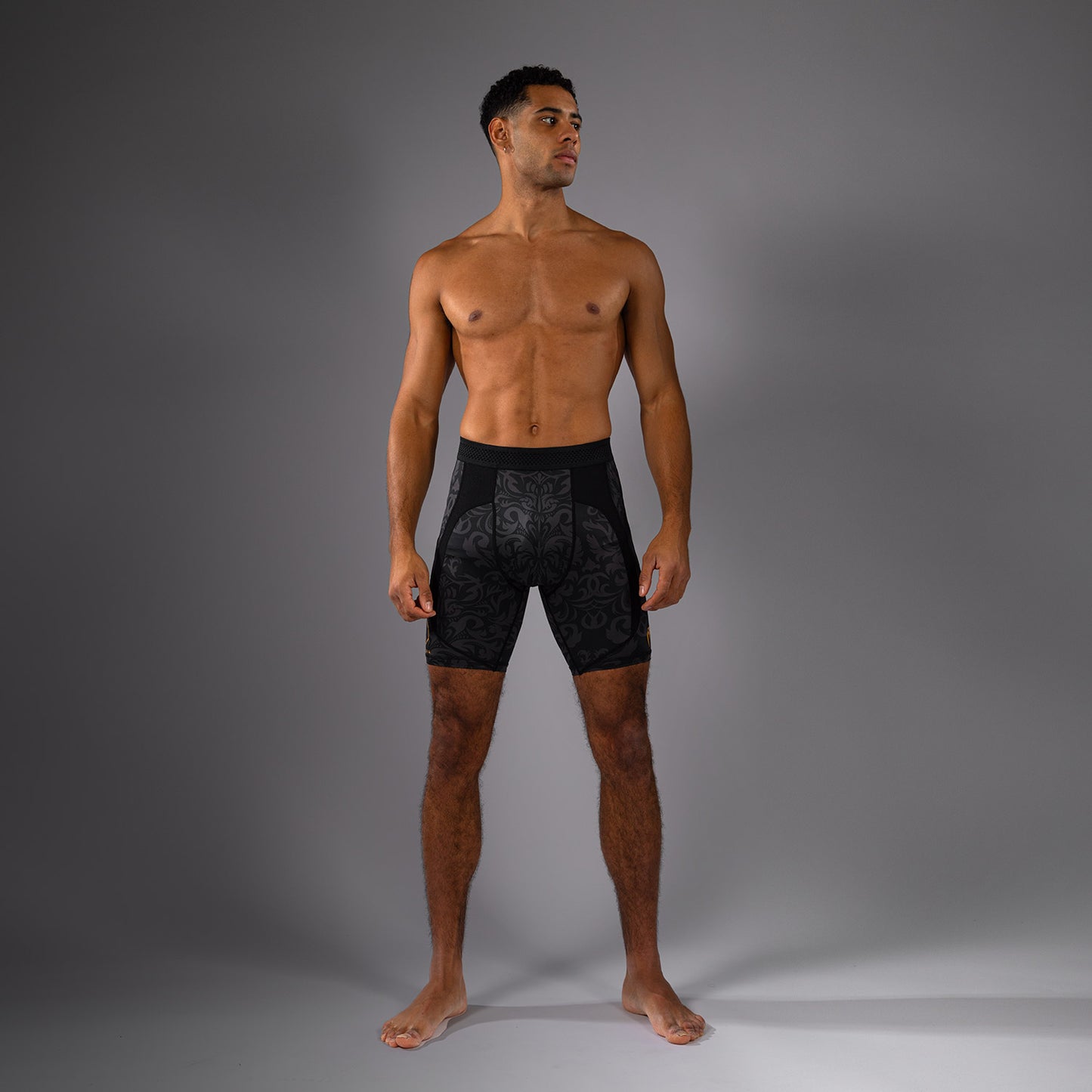 Venum x Topuria Unmatched Edition Pantaloncini a compressione - Nero/Oro