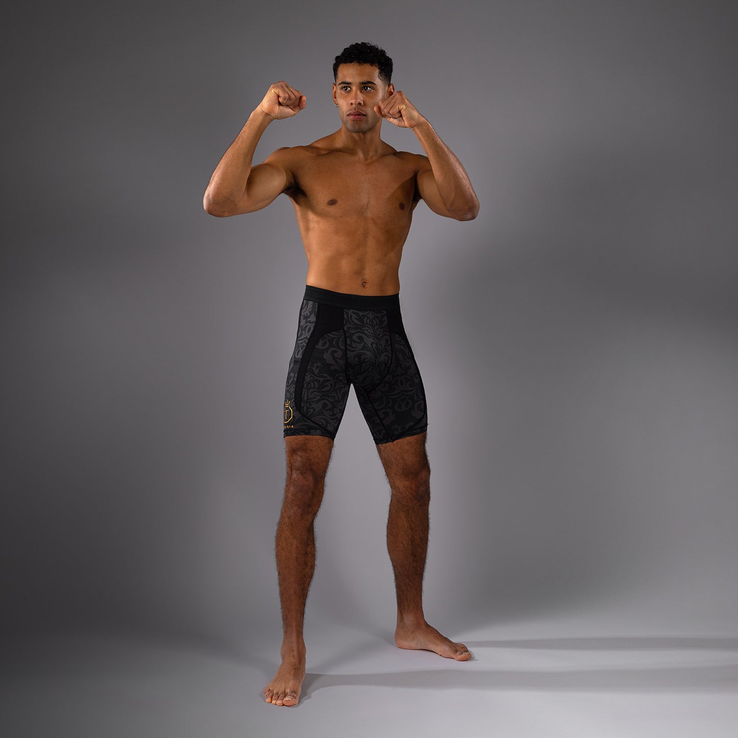 Venum x Topuria Unmatched Edition Pantaloncini a compressione - Nero/Oro