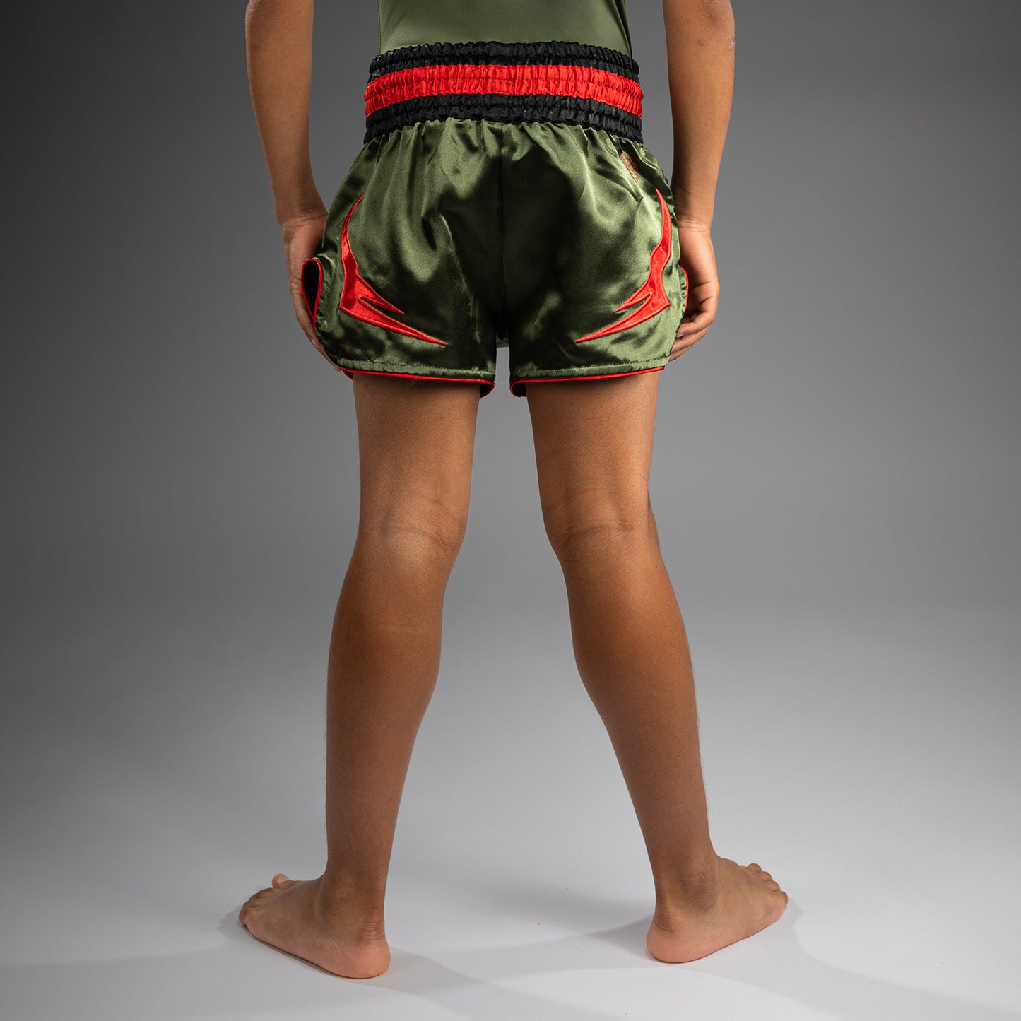 Venum Inferno Pantaloni Muay Thai per Bambini - Verde Militare/Arancione