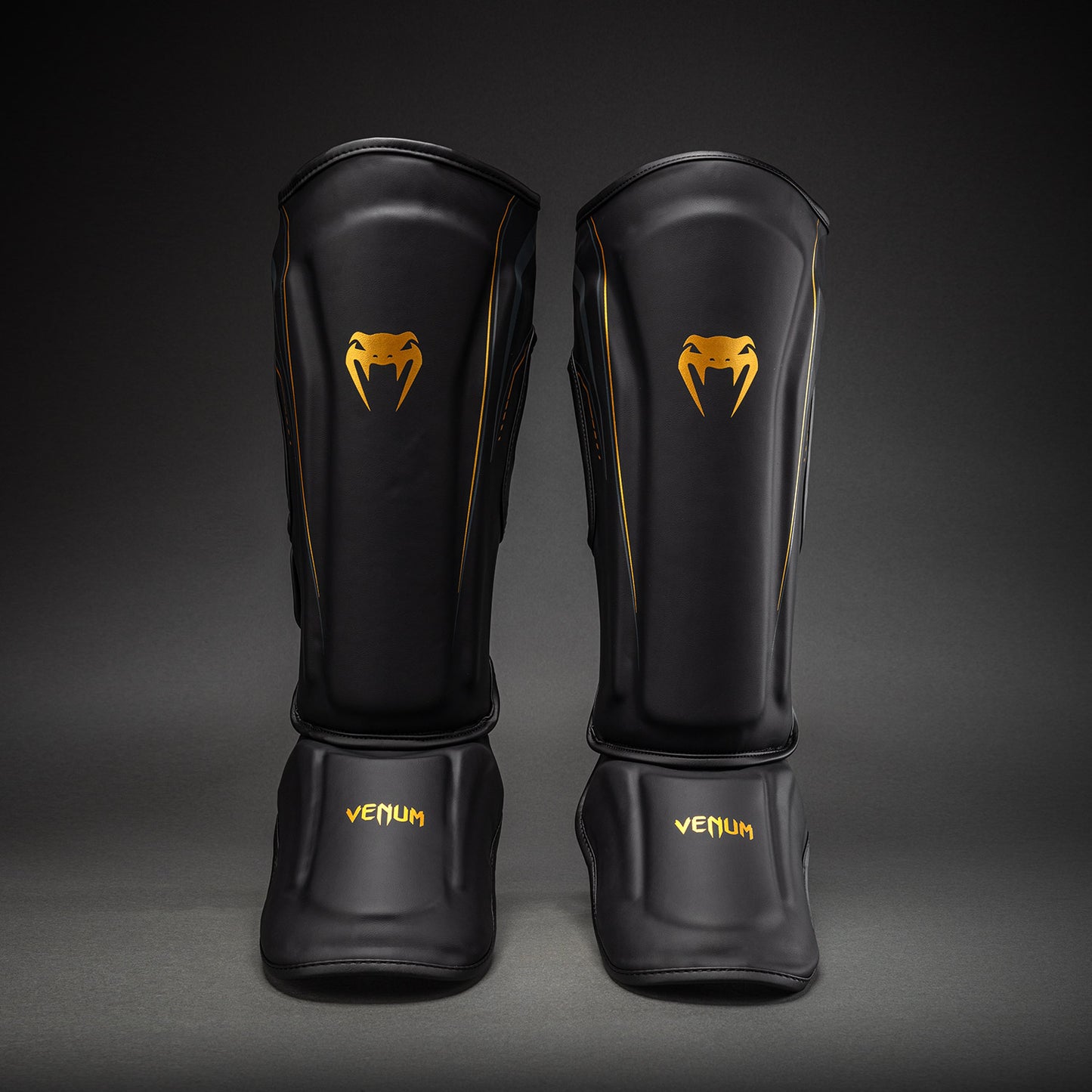 Venum Streamline Paratibie – Nero/Oro