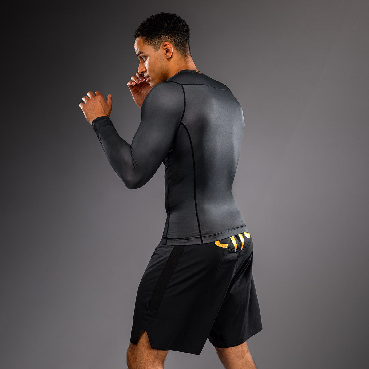 Venum Attack Rashguard a maniche lunghe - Nero/Oro