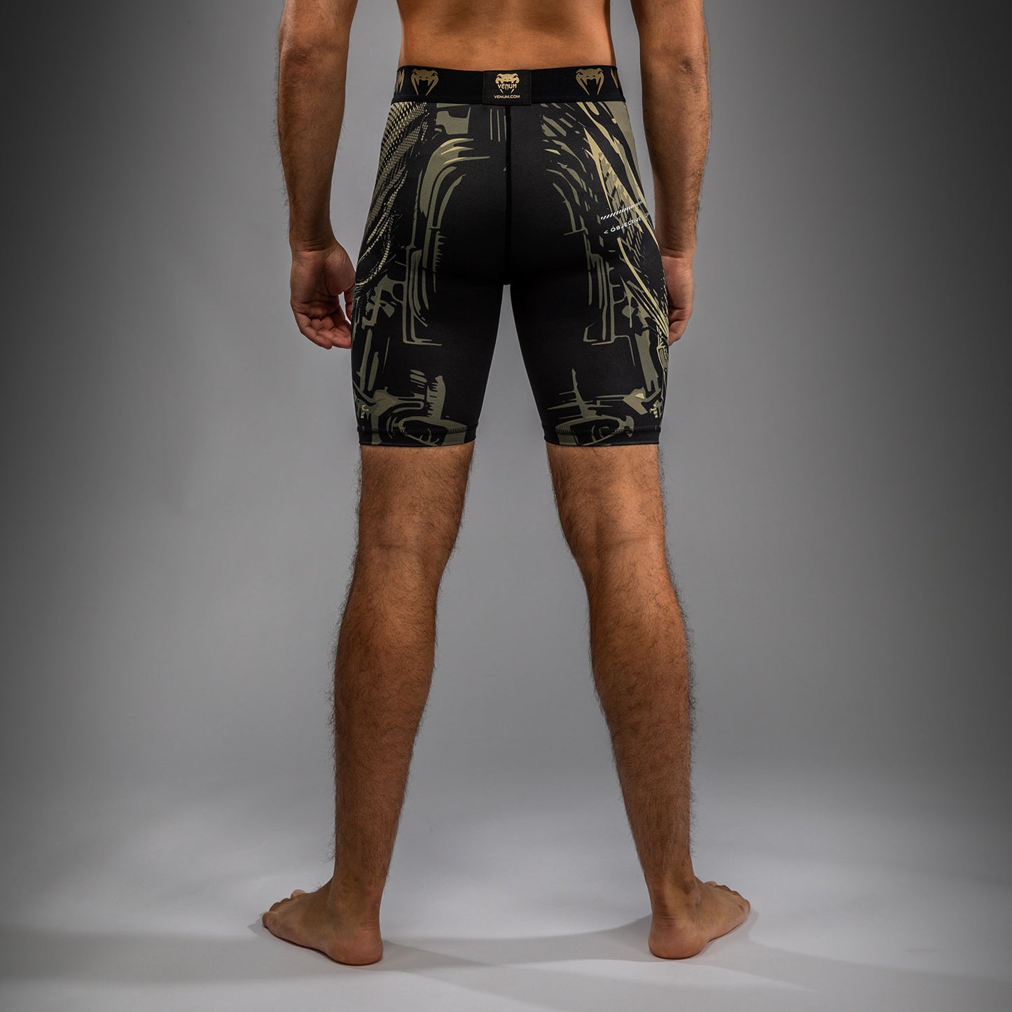 Venum Invader Pantaloncini a compressione - Nero/Sabbia