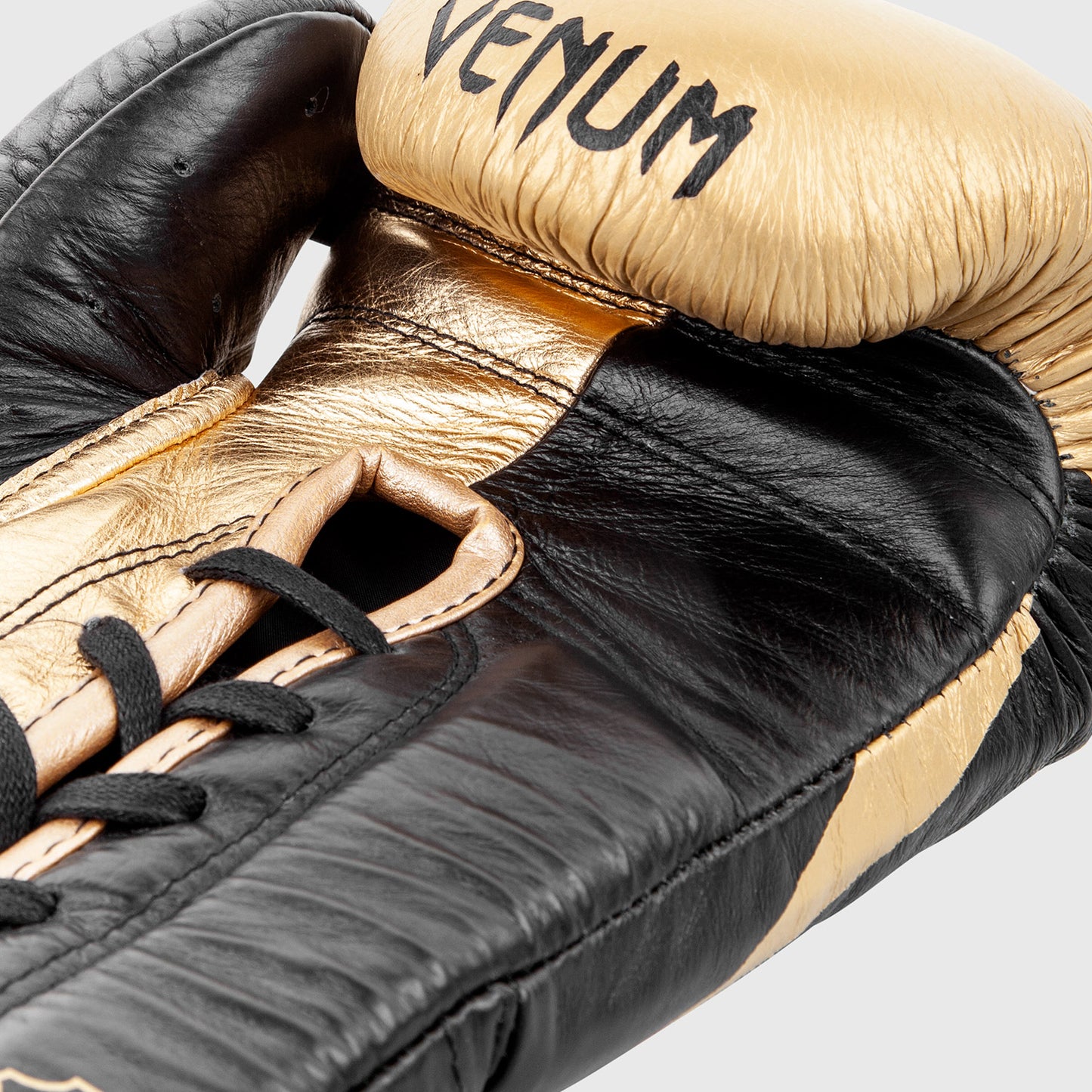 Guantoni da boxe professionali Venum Hammer con lacci - Nero/Oro
