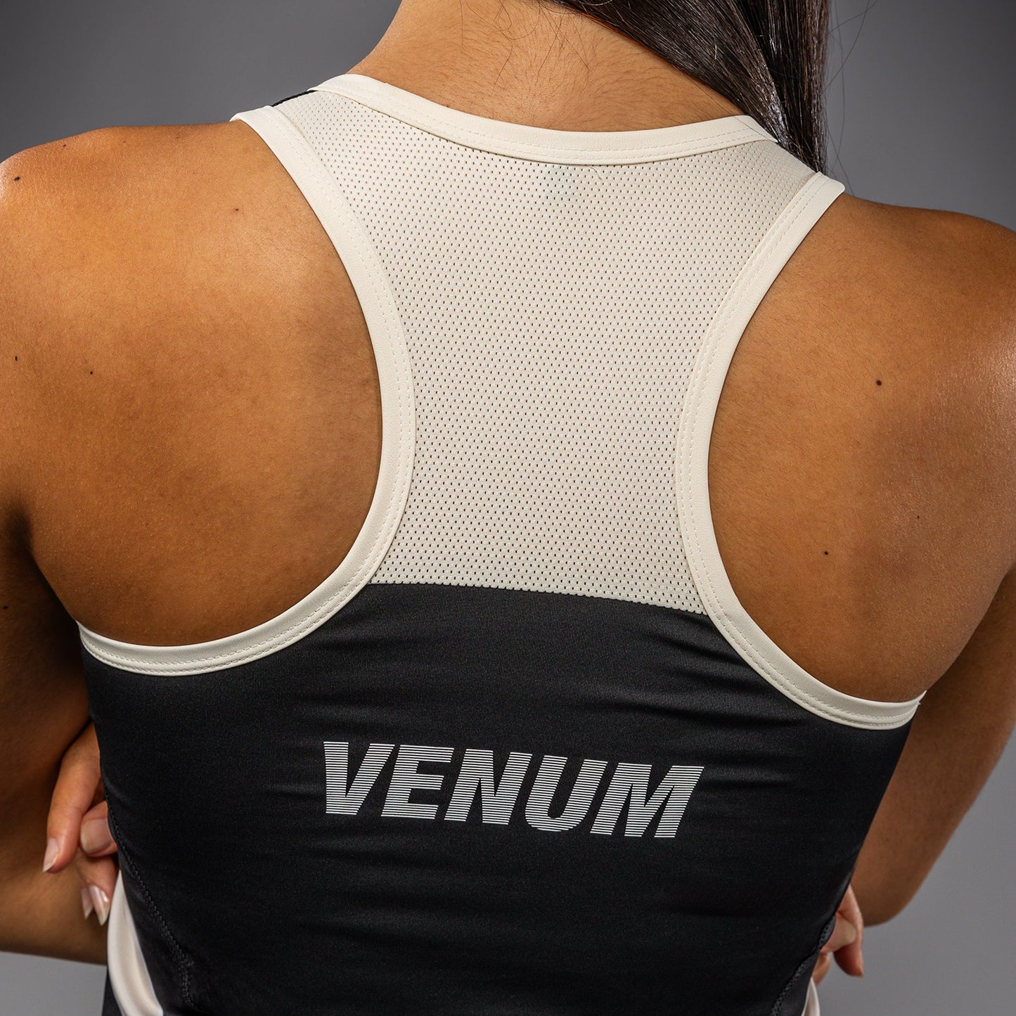 Venum Adrenaline Canotta tecnica Dry Tech da donna – Nero/Avorio