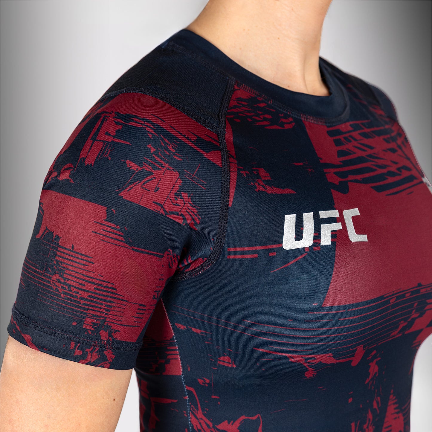 UFC Zenith by Venum Authentic Fight Week Rashguard maniche corte Performance Donna - Blu navy/Bordeaux/Argento