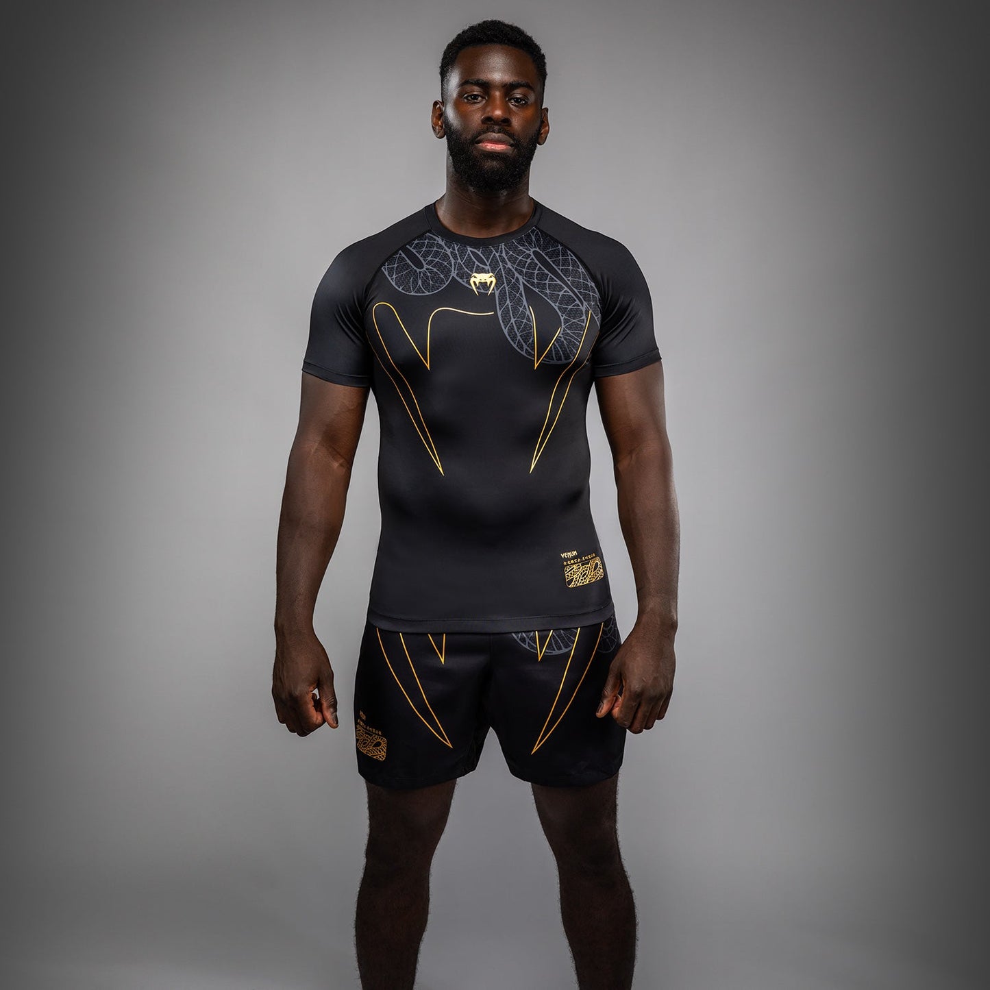 Venum Serpenti Rashguard a maniche corte – Nero/Argento/Oro