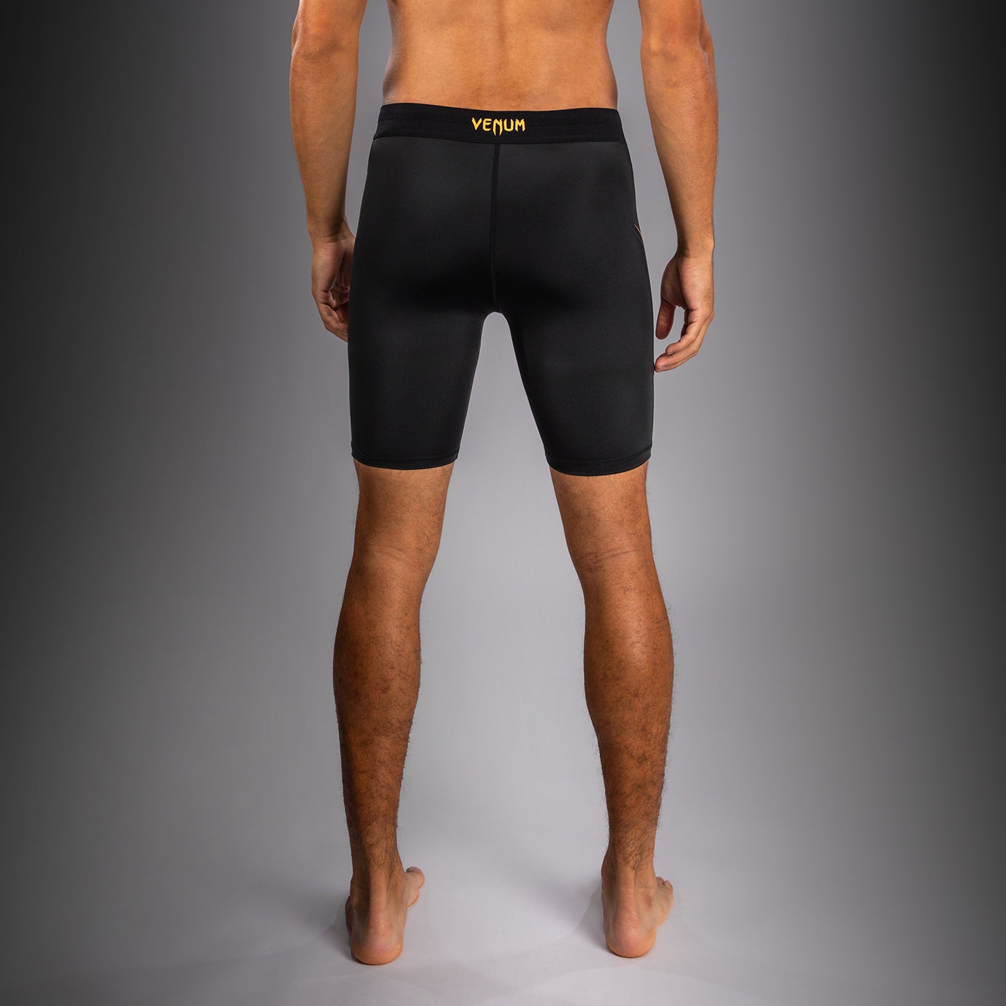 Venum G-Core Pantaloncini a Compressione - Nero/Oro