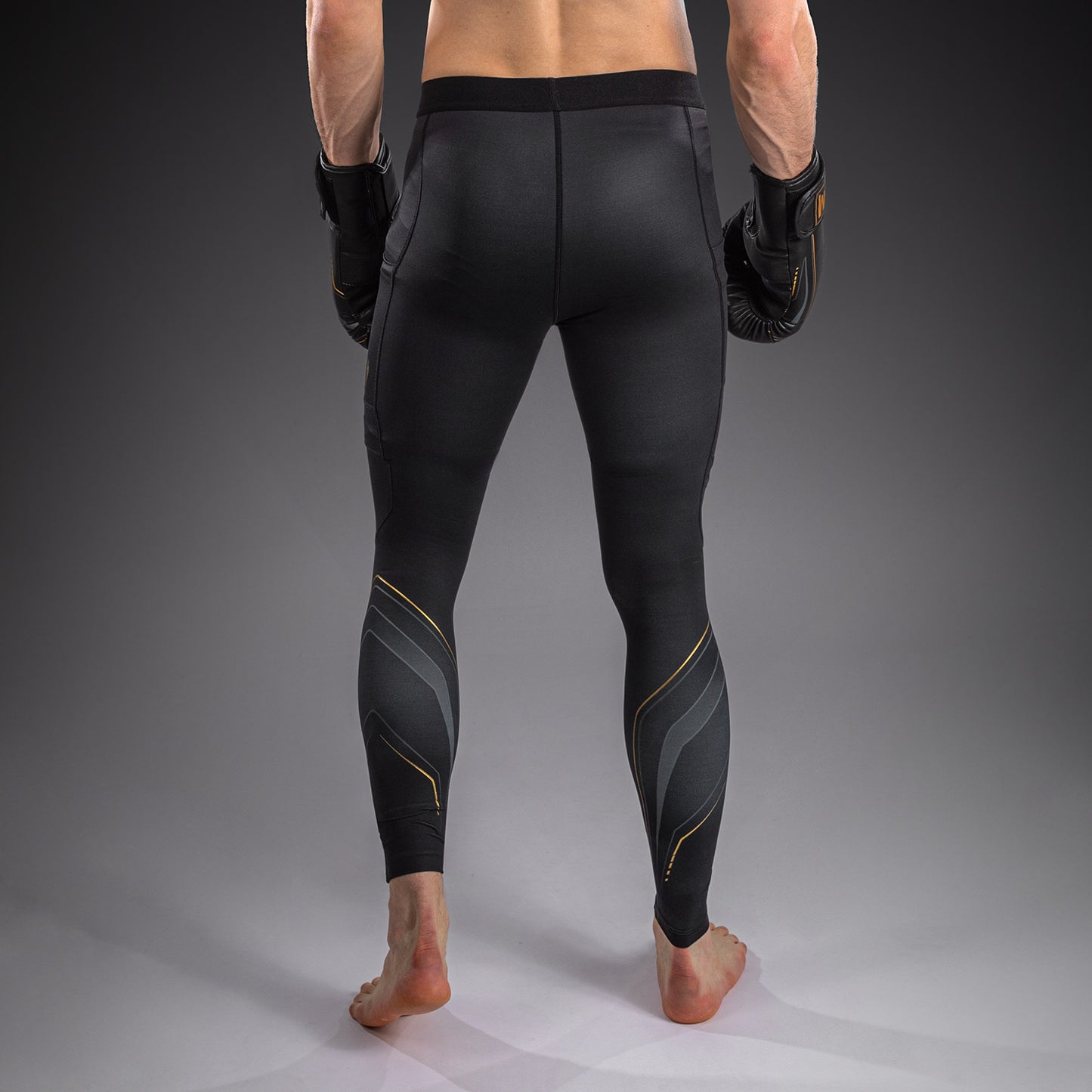 Venum Streamline Spats – Nero/Oro