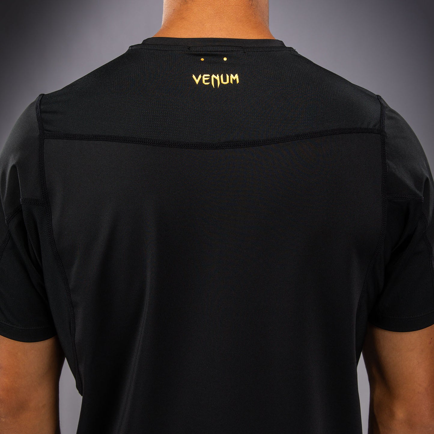 Venum G-Core Maglietta Dry Tech - Nero/Oro