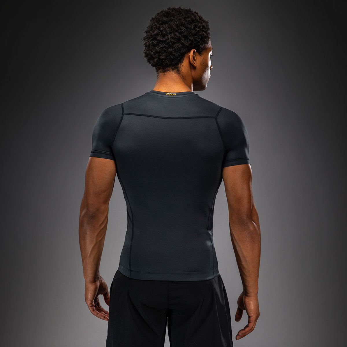Venum Attack Rashguard a maniche corte - Nero/Oro
