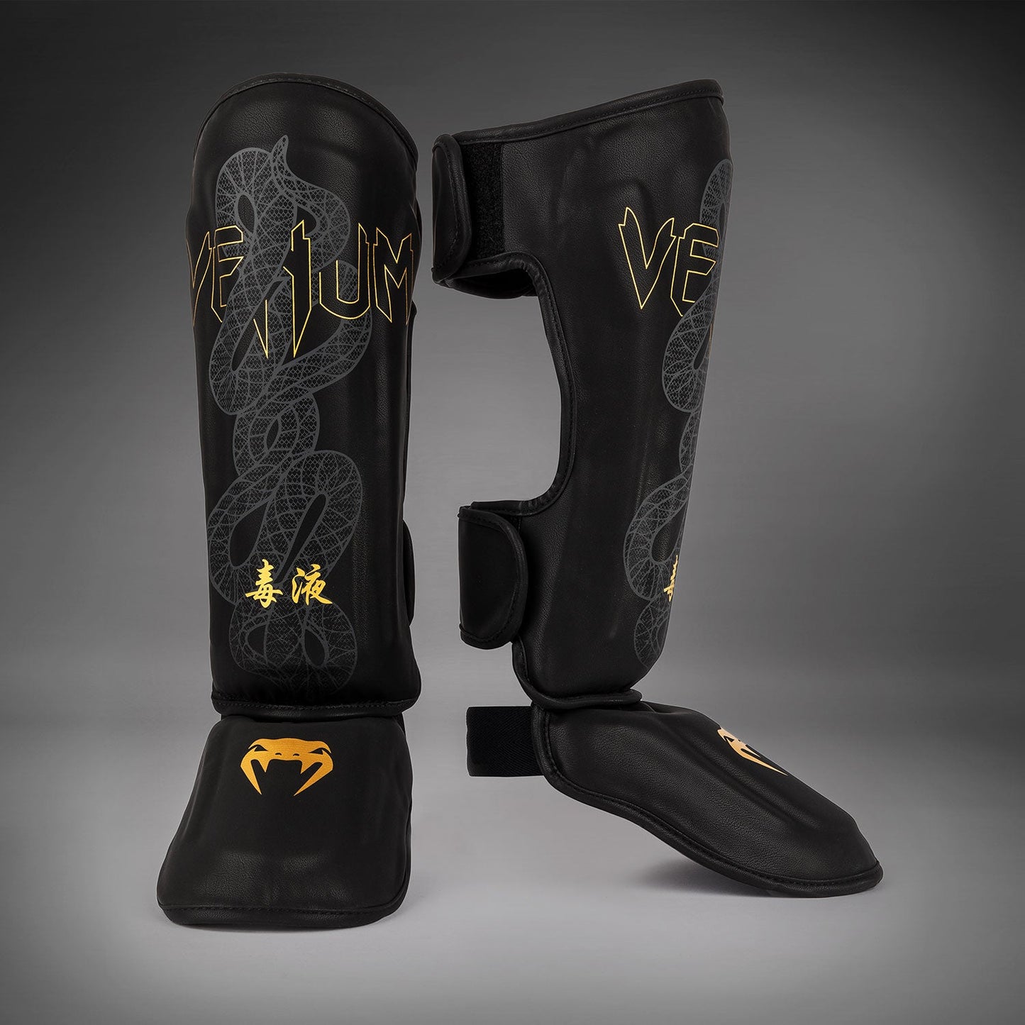 Venum Serpenti Paratibie – Nero/Argento/Oro