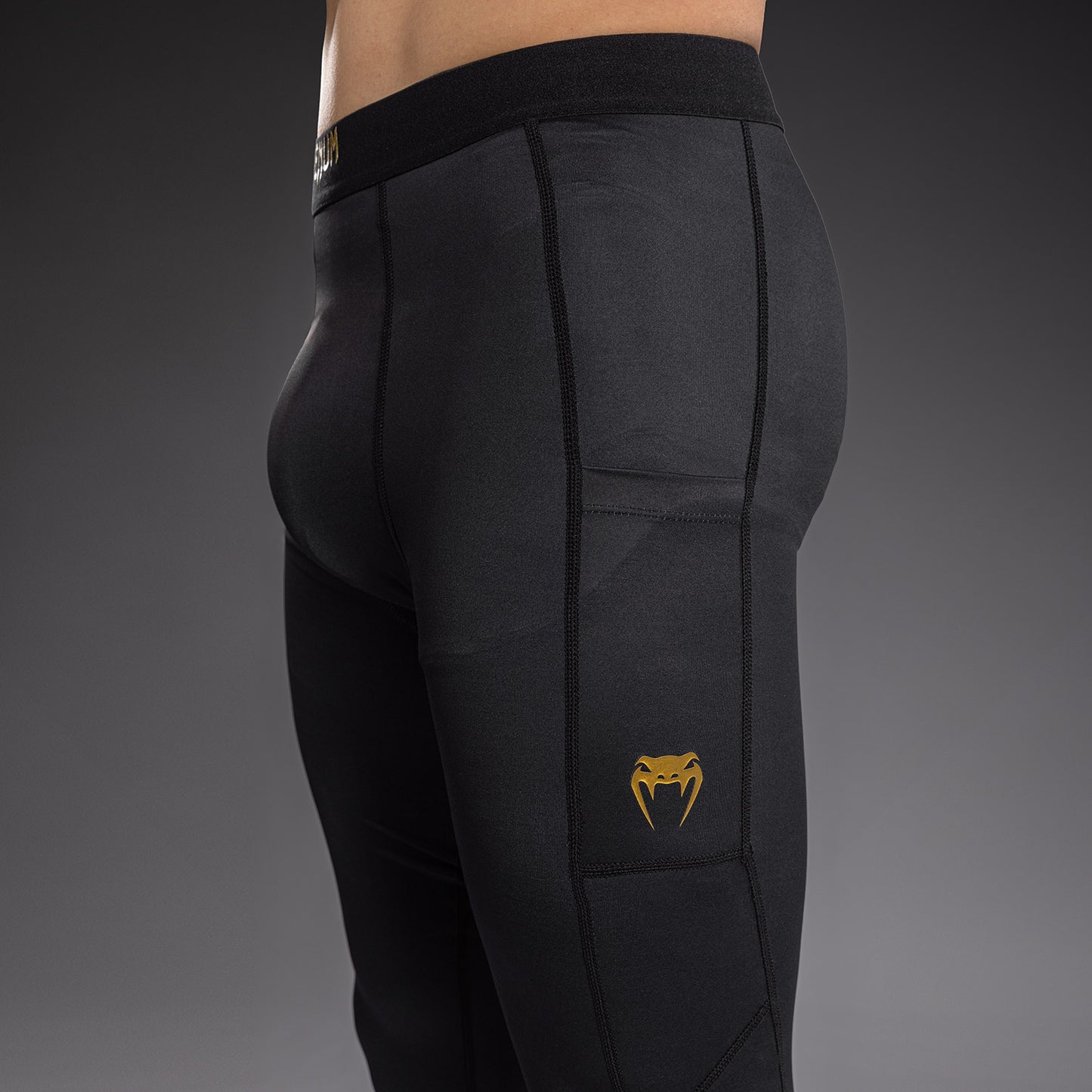 Venum Streamline Spats – Nero/Oro