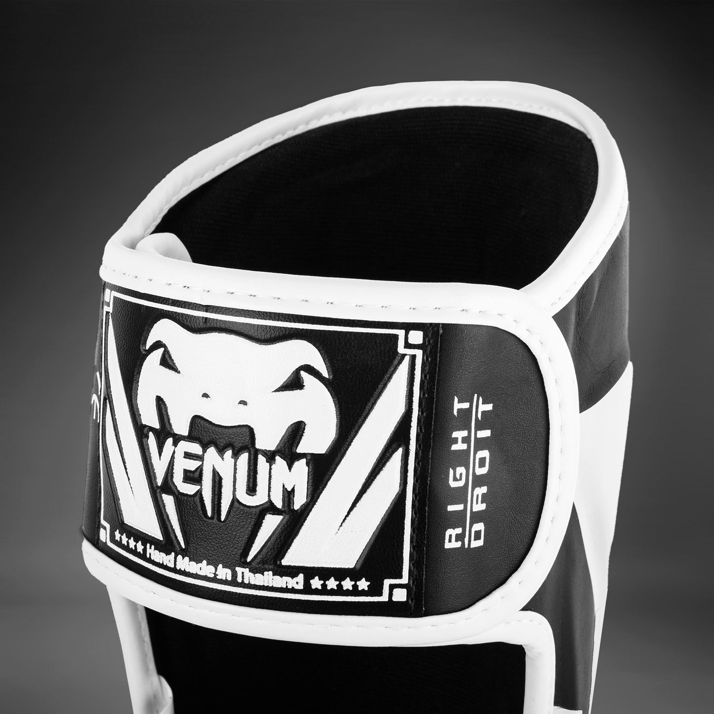 Venum Elite Parastinchi con parapiede - Nero/Bianco