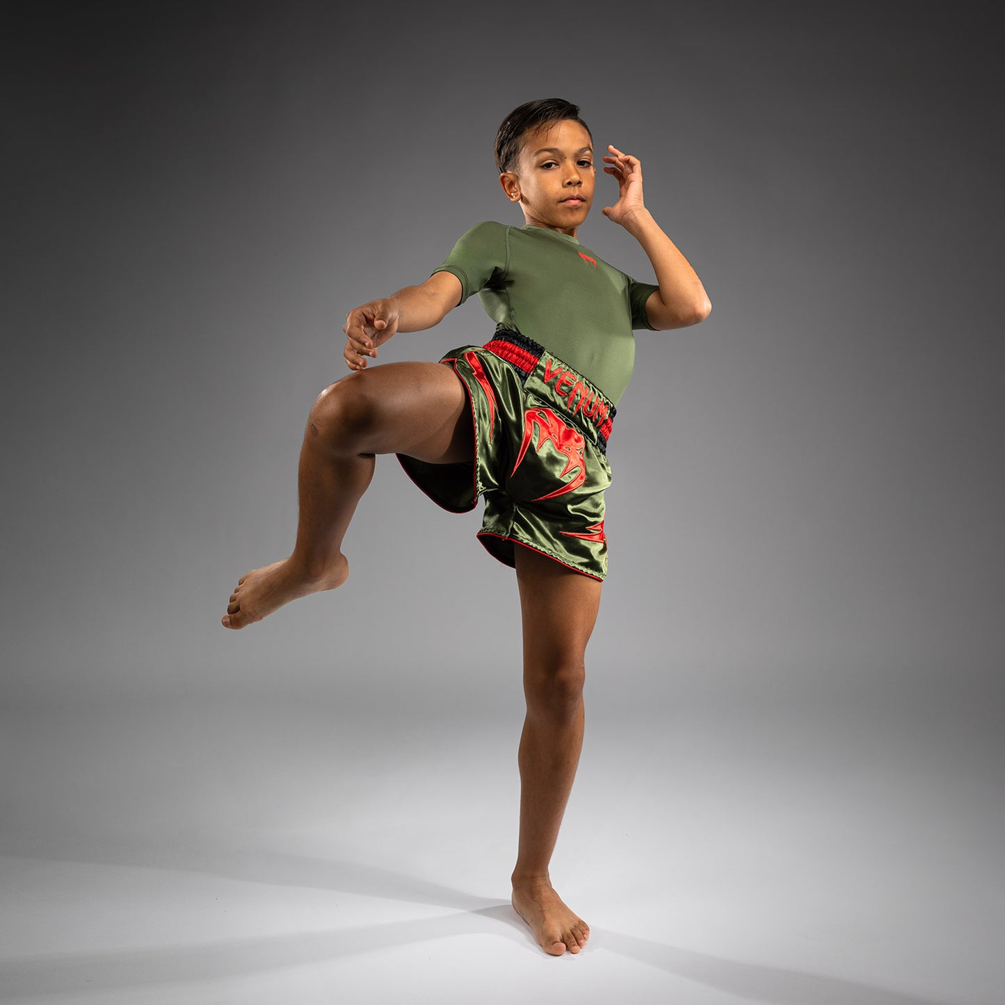 Venum Inferno Pantaloni Muay Thai per Bambini - Verde Militare/Arancione