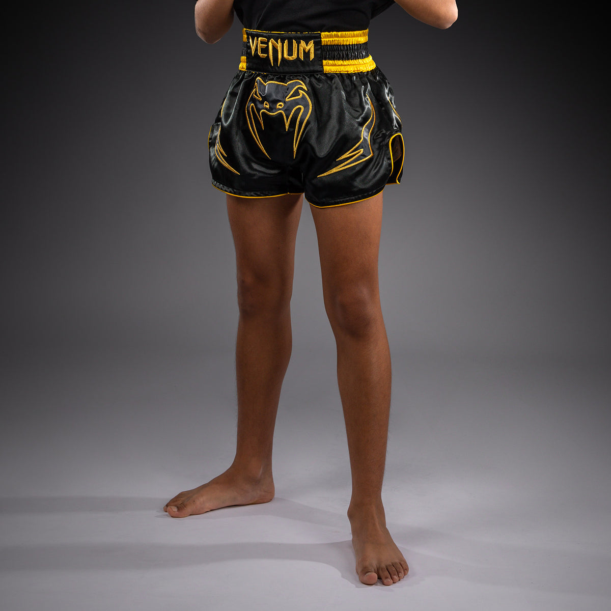Venum Bangkok Fury Pantaloncini da Muay Thai per bambini - Nero/Oro