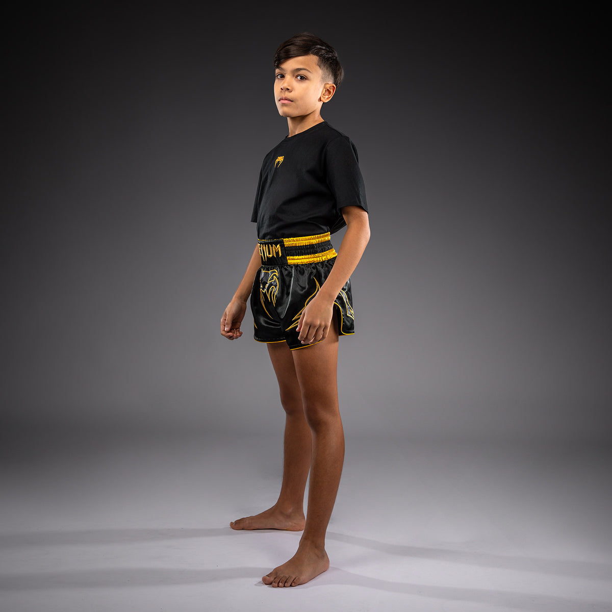 Venum Bangkok Fury Pantaloncini da Muay Thai per bambini - Nero/Oro