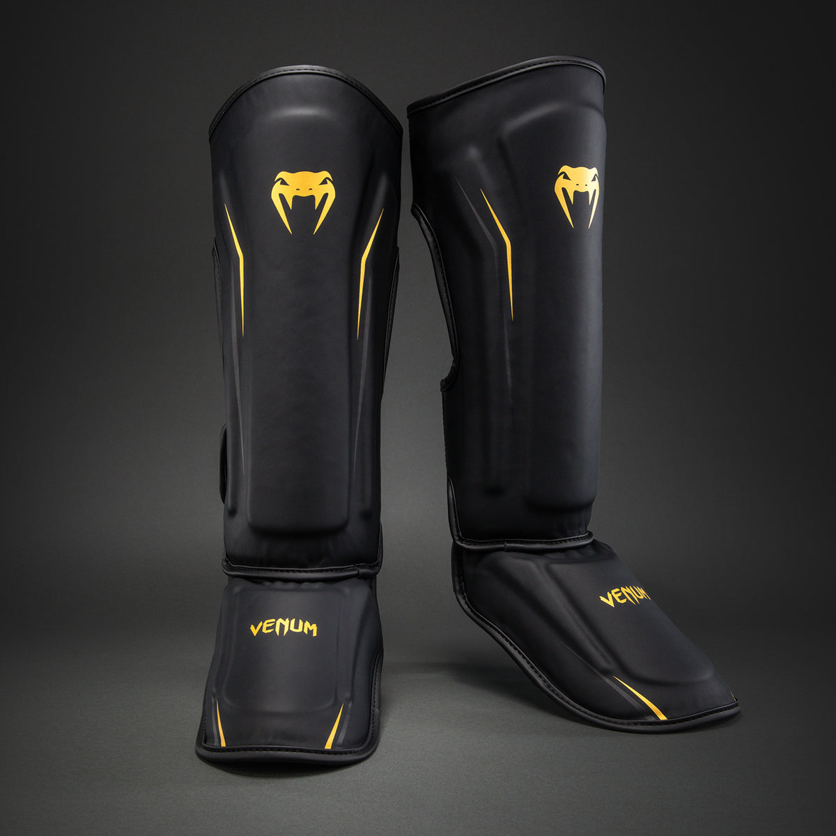 Venum G-Core Paratibie - Nero/Oro
