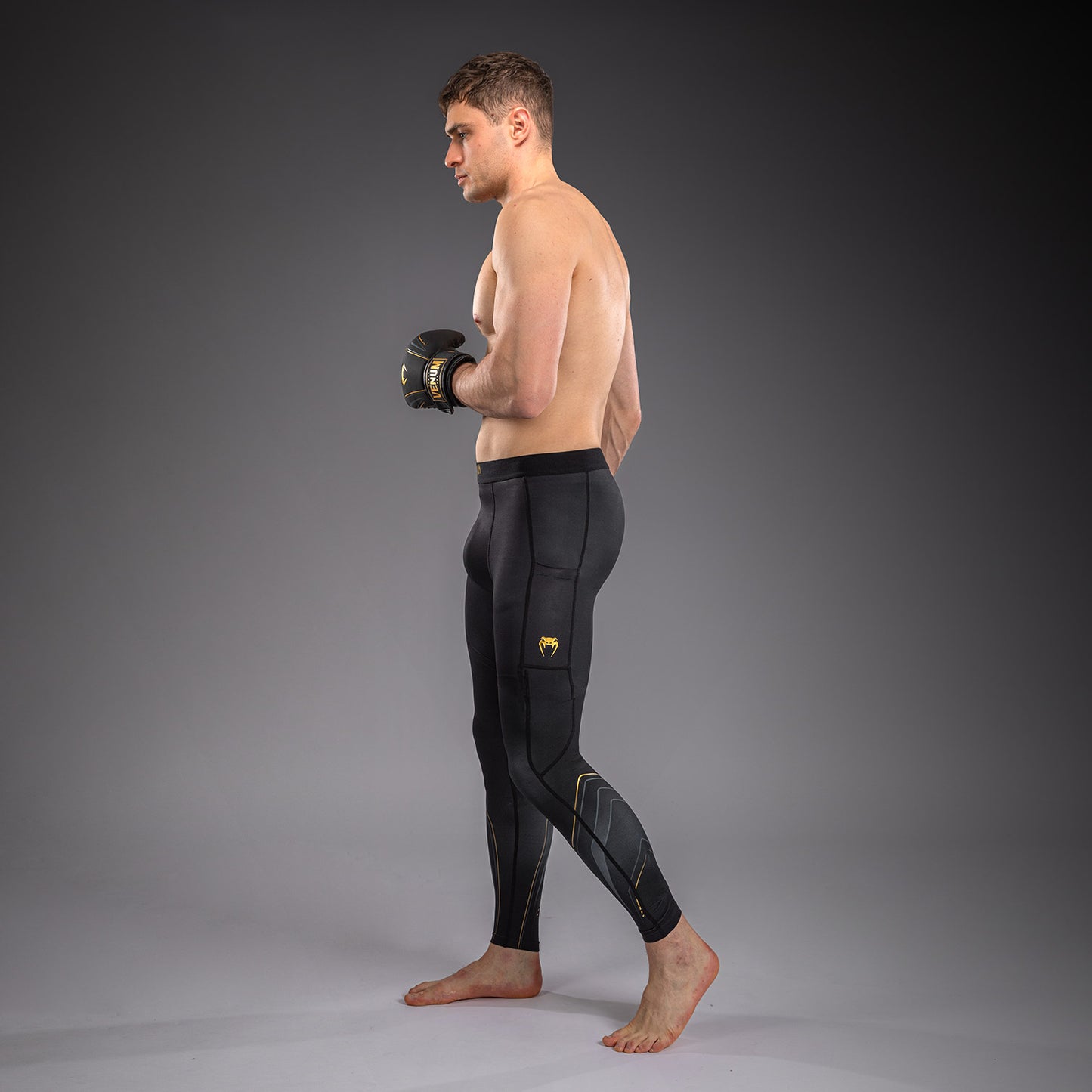 Venum Streamline Spats – Nero/Oro