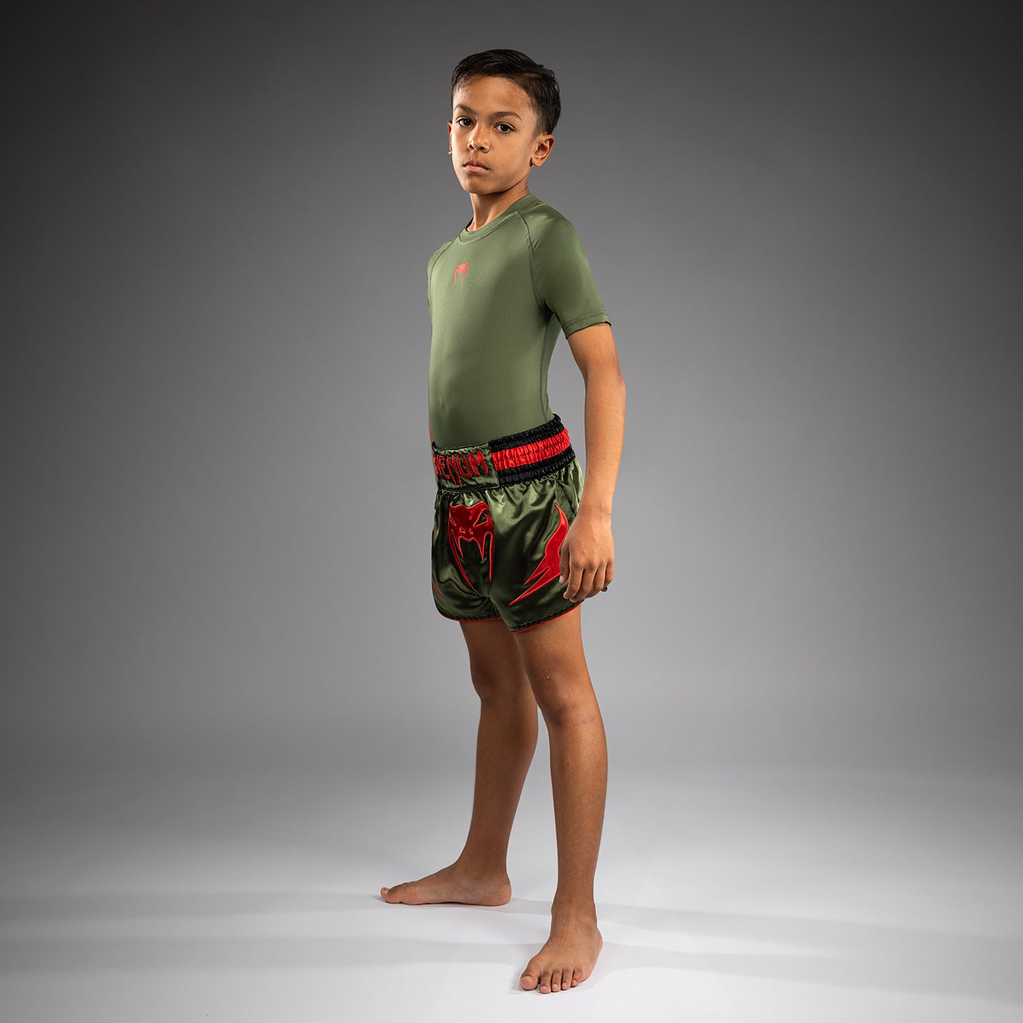 Venum Inferno Pantaloni Muay Thai per Bambini - Verde Militare/Arancione