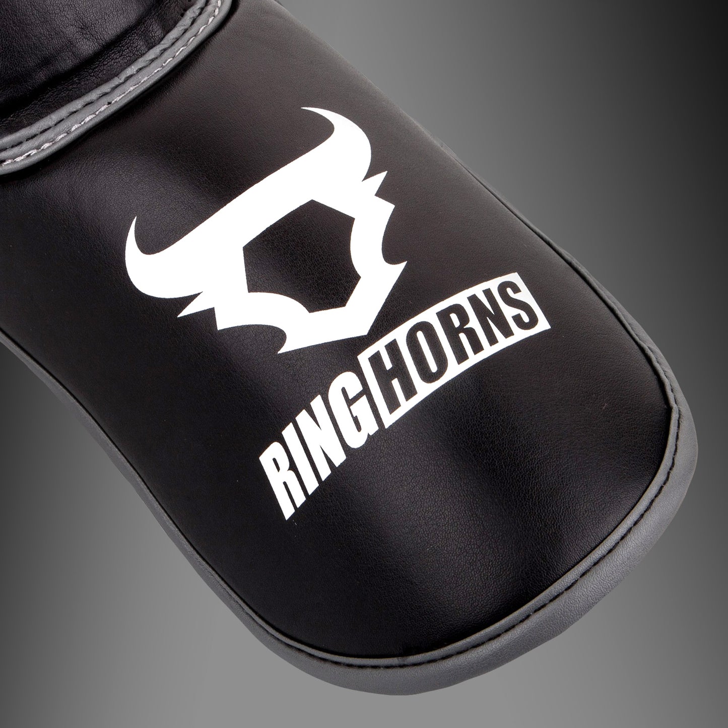Ringhorns Charger by Venum Shin Guards and Foot Protectors – Nero