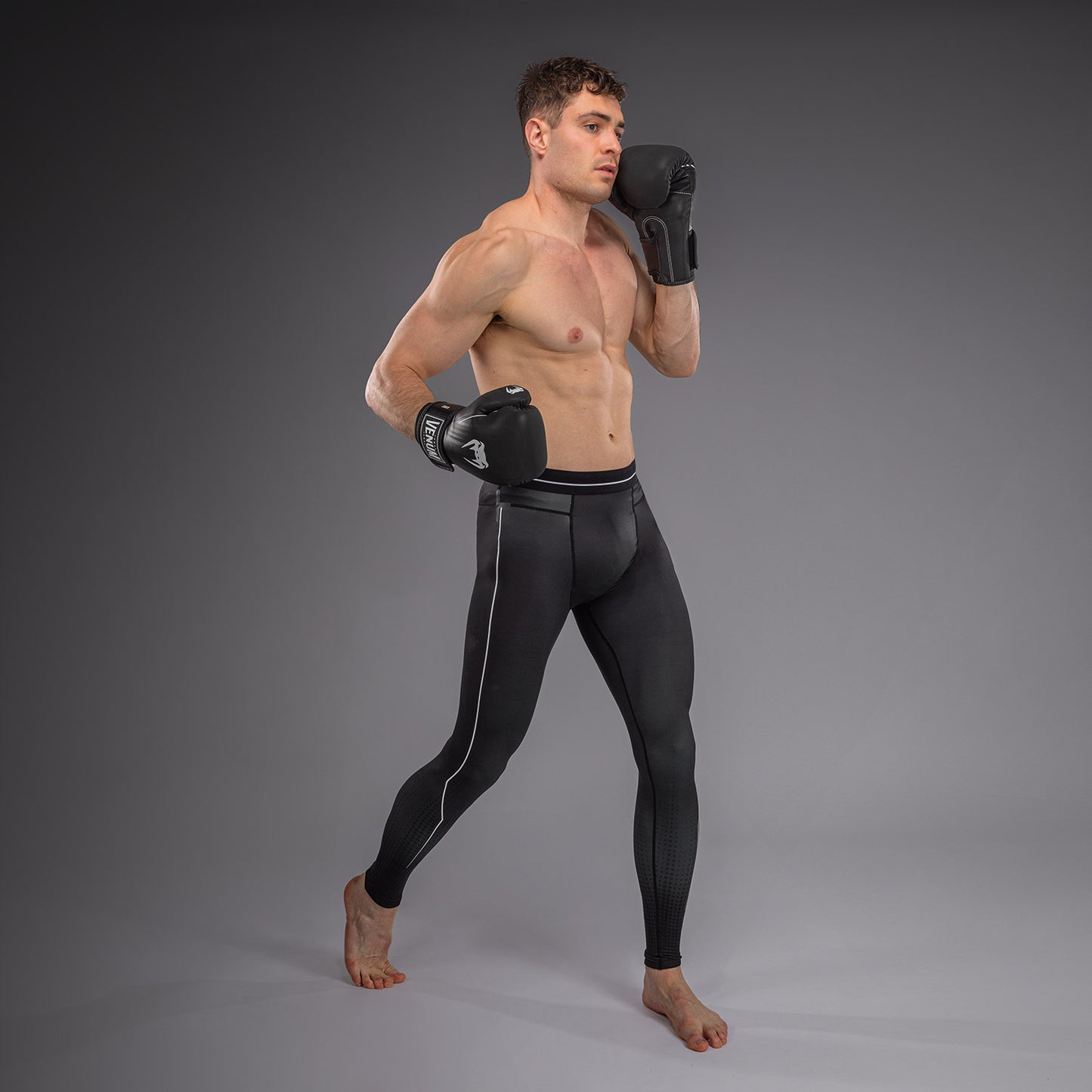 Venum Stealth Spats – Nero/Bianco