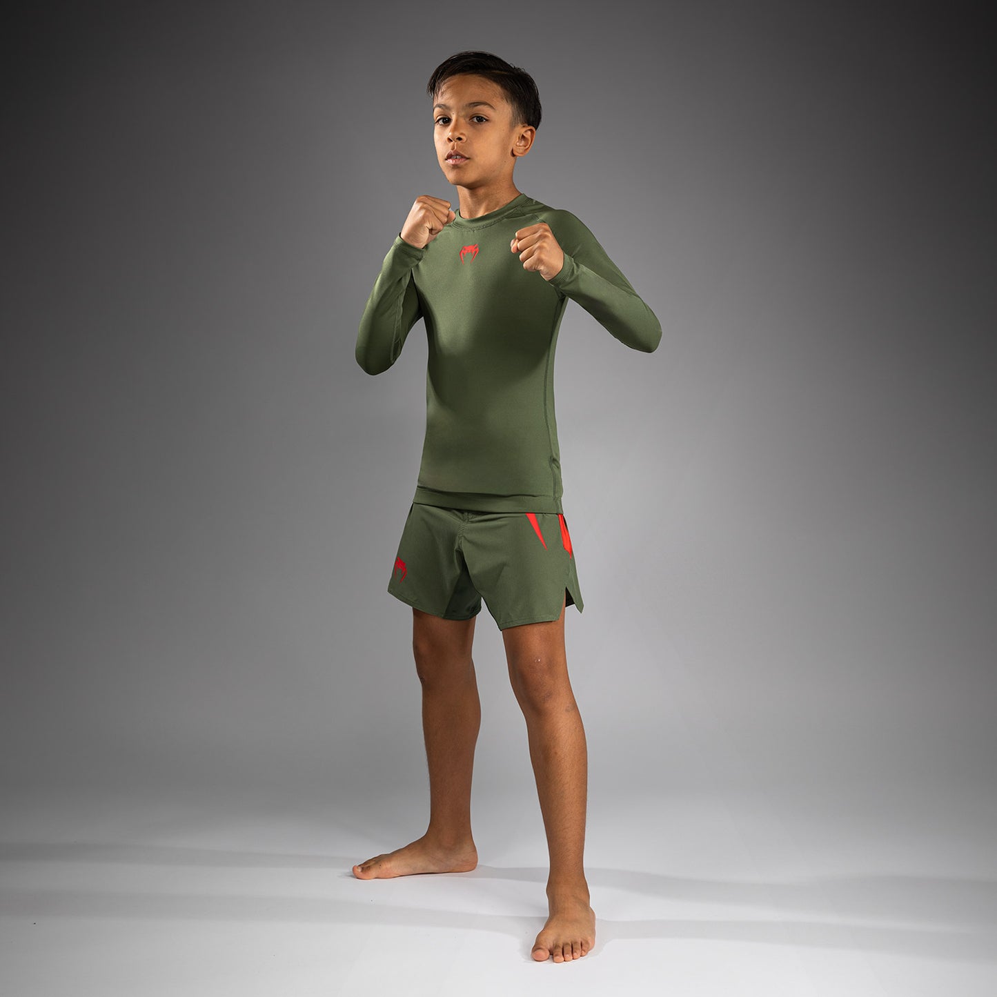 Venum Contender Rashguards Maniche Lunghe per Bambini - Verde Militare/Arancione