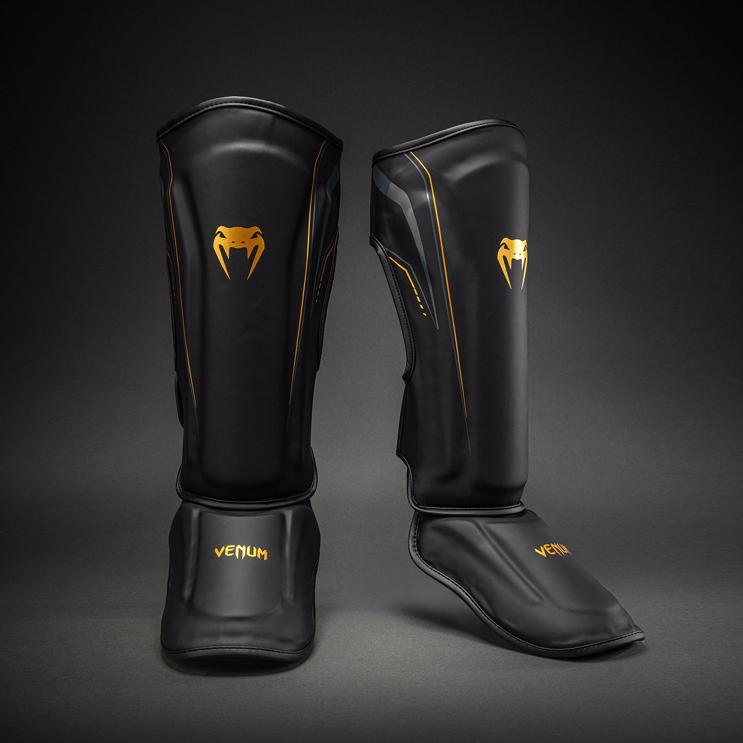 Venum Streamline Paratibie – Nero/Oro