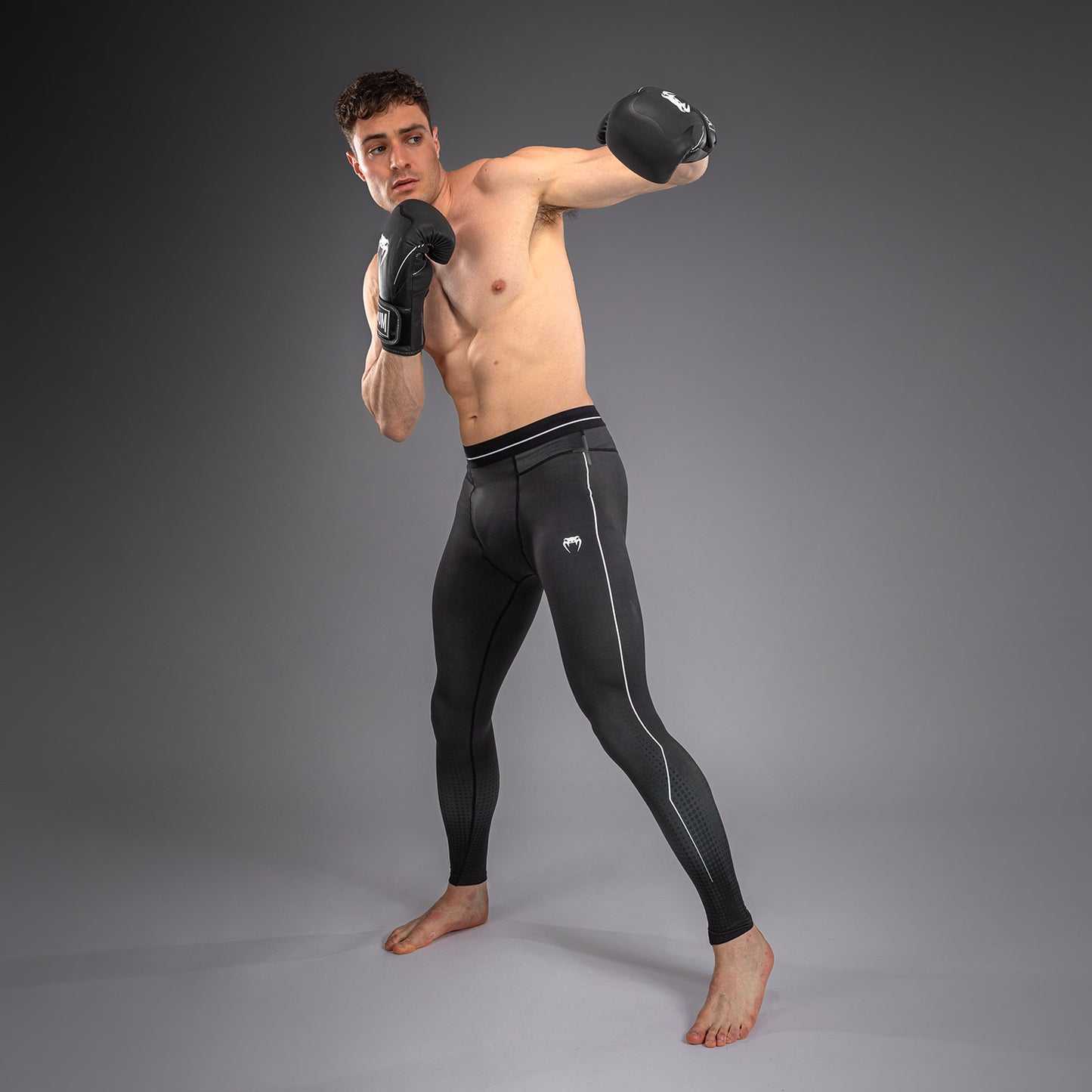 Venum Stealth Spats – Nero/Bianco