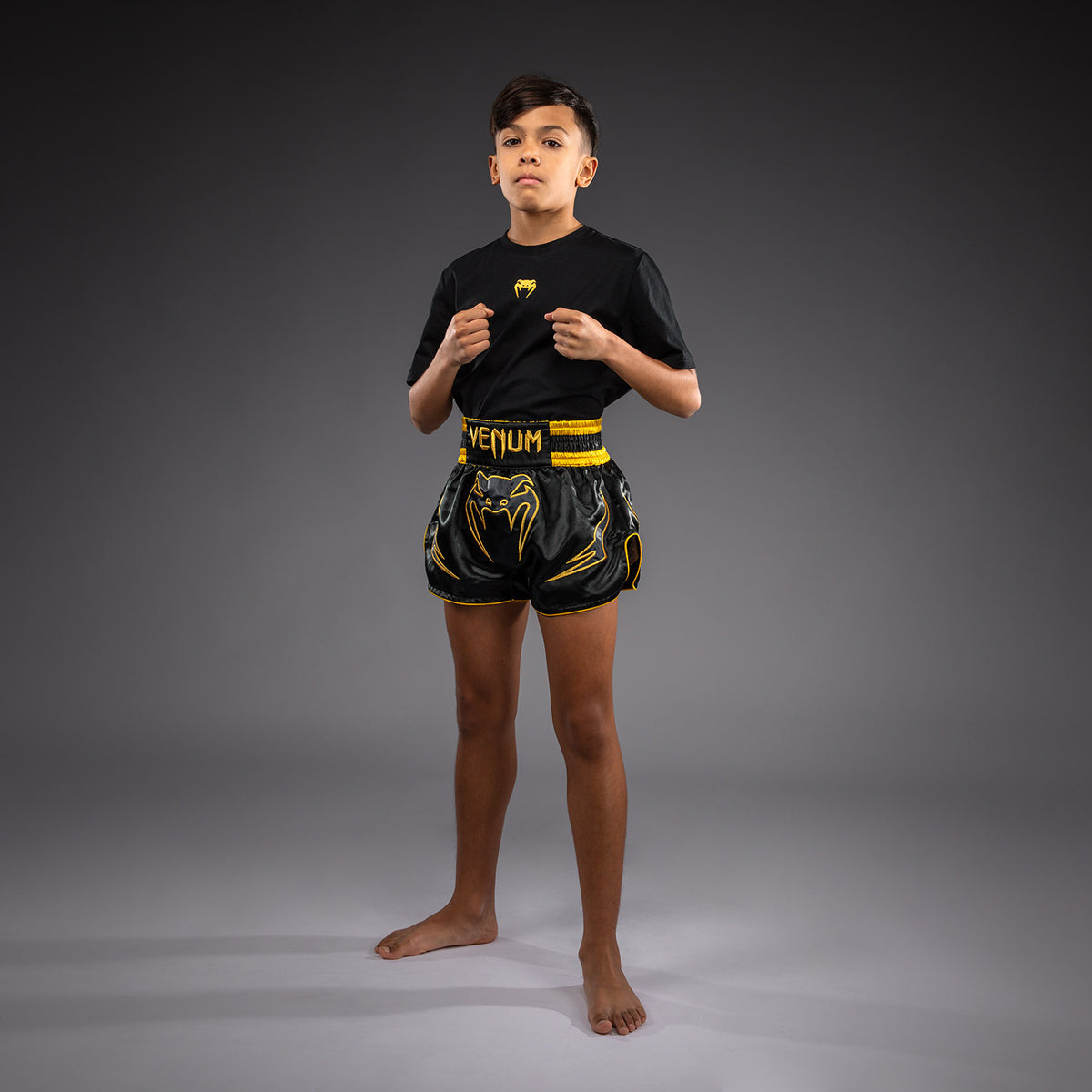 Venum Bangkok Fury Pantaloncini da Muay Thai per bambini - Nero/Oro