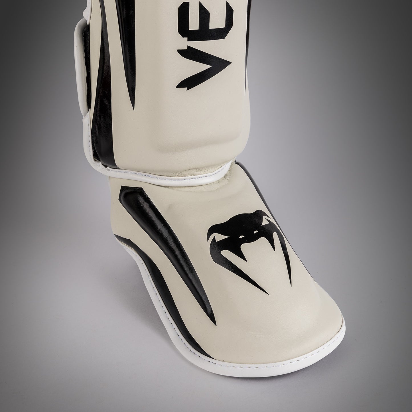 Venum Elite Parastinchi con parapiede - Bianco/Nero
