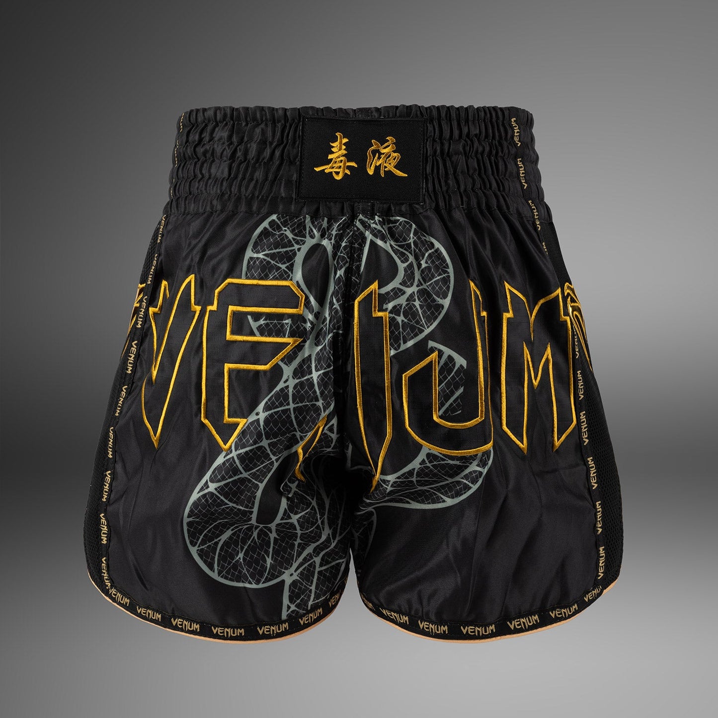 Venum Serpenti Pantaloncini Muay Thai – Nero/Argento/Oro