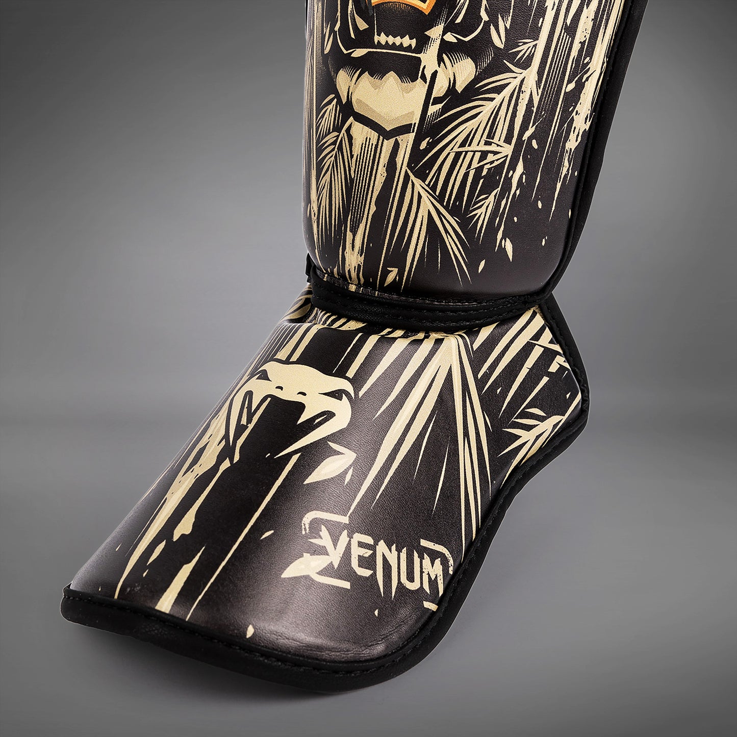 Venum Tiger Parastinchi Bambini - Nero/Arancione Neon