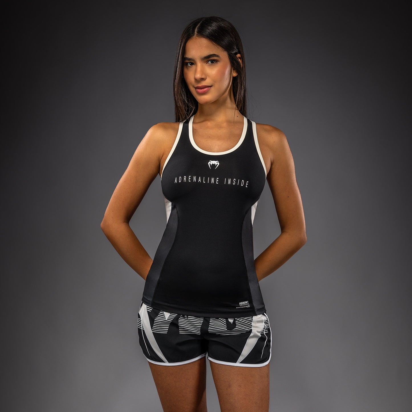 Venum Adrenaline Canotta tecnica Dry Tech da donna – Nero/Avorio