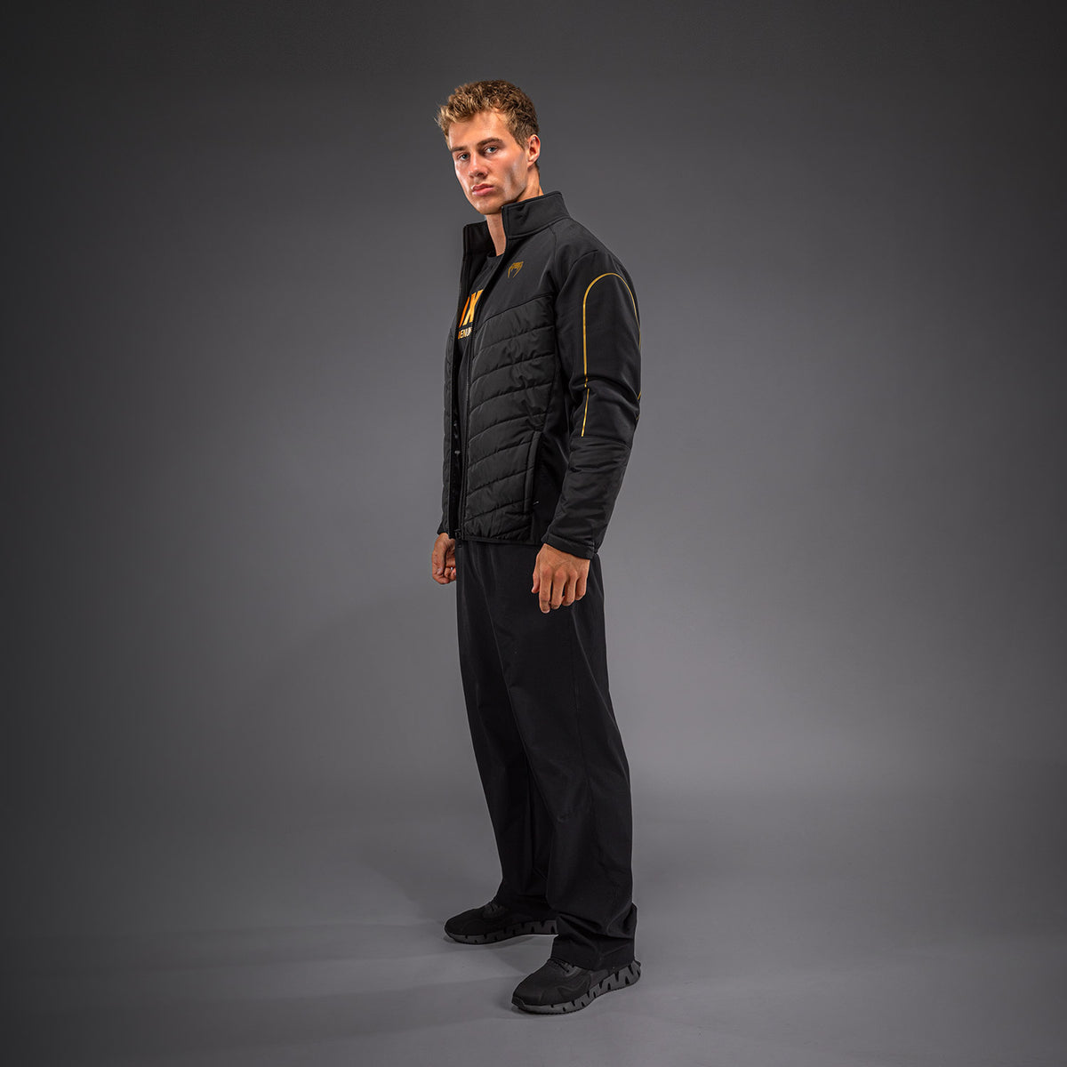 Venum Paddock Giacca softshell - Nero/Oro