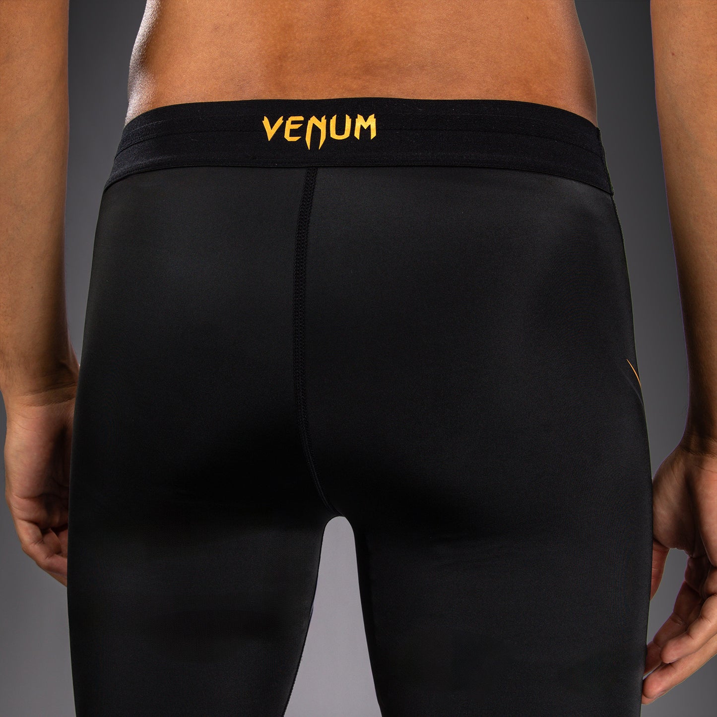 Venum G-Core Pantaloncini a Compressione - Nero/Oro