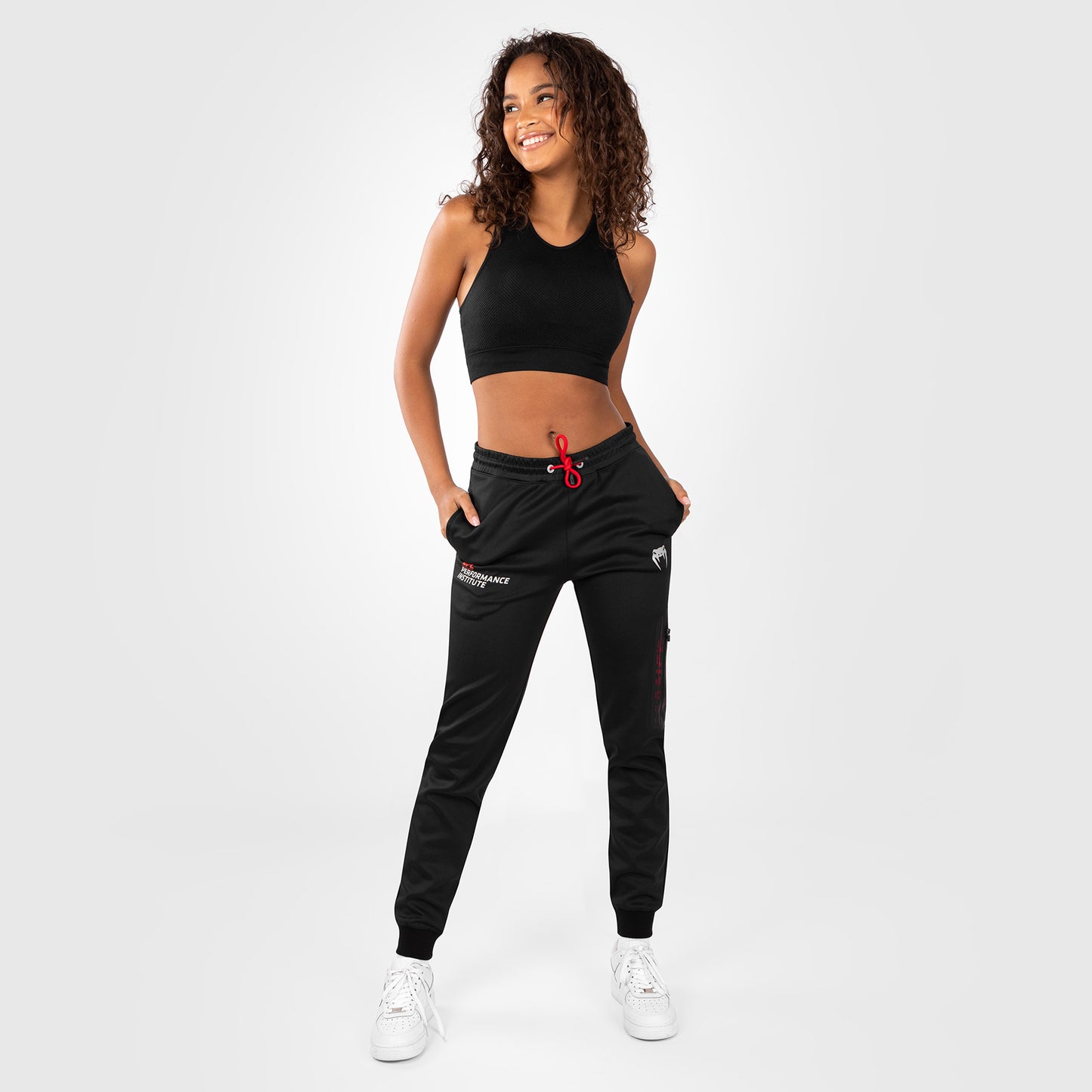 UFC Venum Performance Institute 2.0 Pantaloni da Jogging per Donna - Nero/Rosso