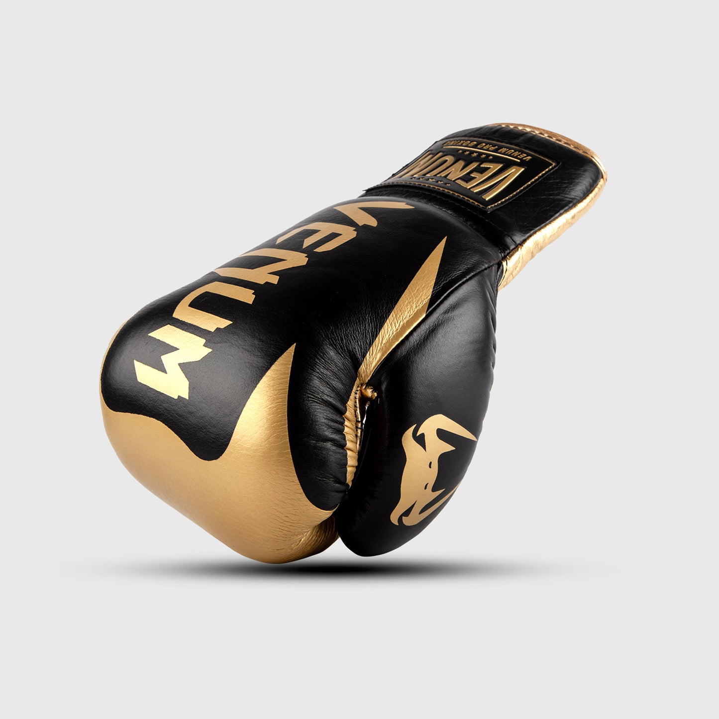 Guantoni da boxe professionali Venum Hammer con lacci - Nero/Oro