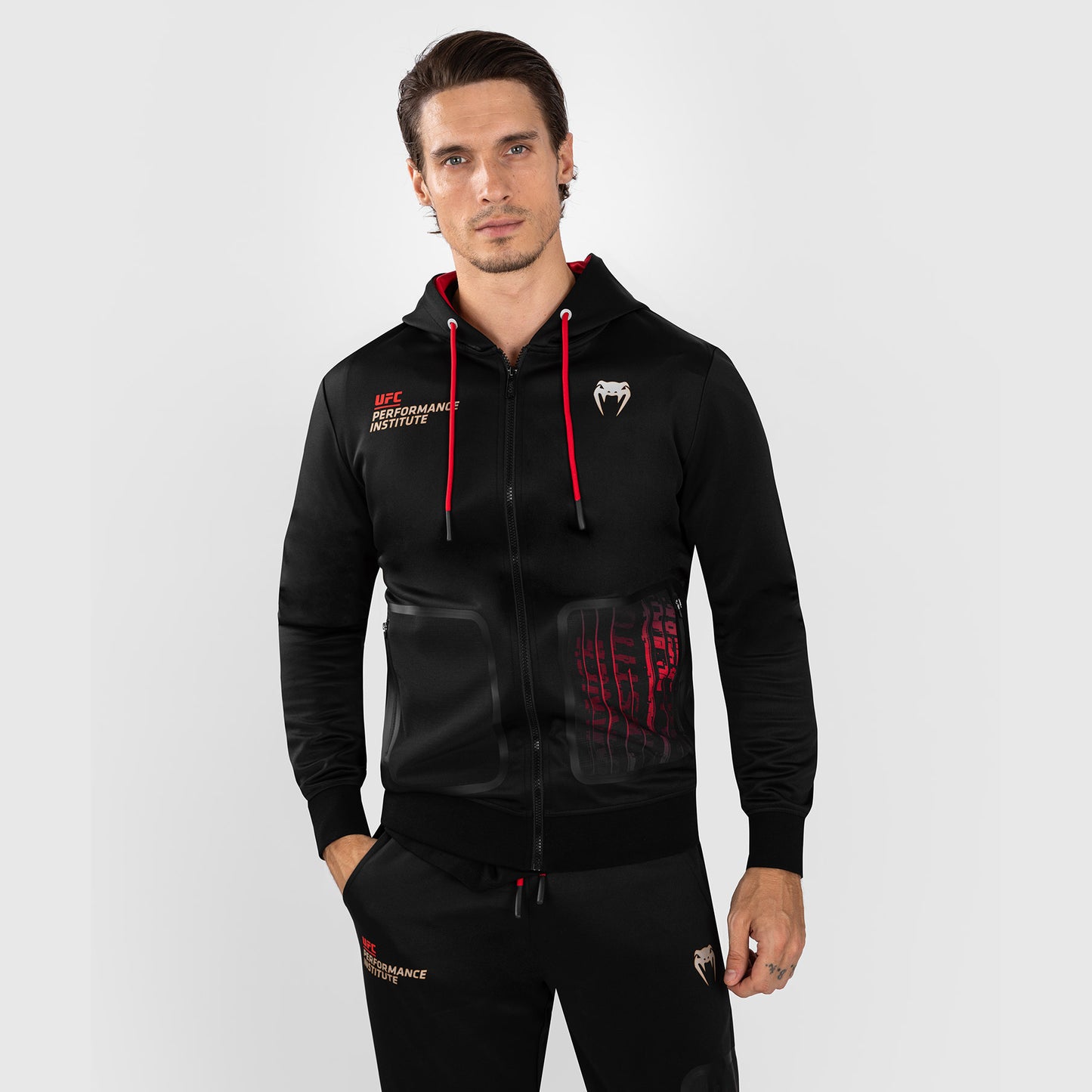 UFC Venum Performance Institute 2.0 Felpa con cappuccio con zip da uomo - Nero/Rosso