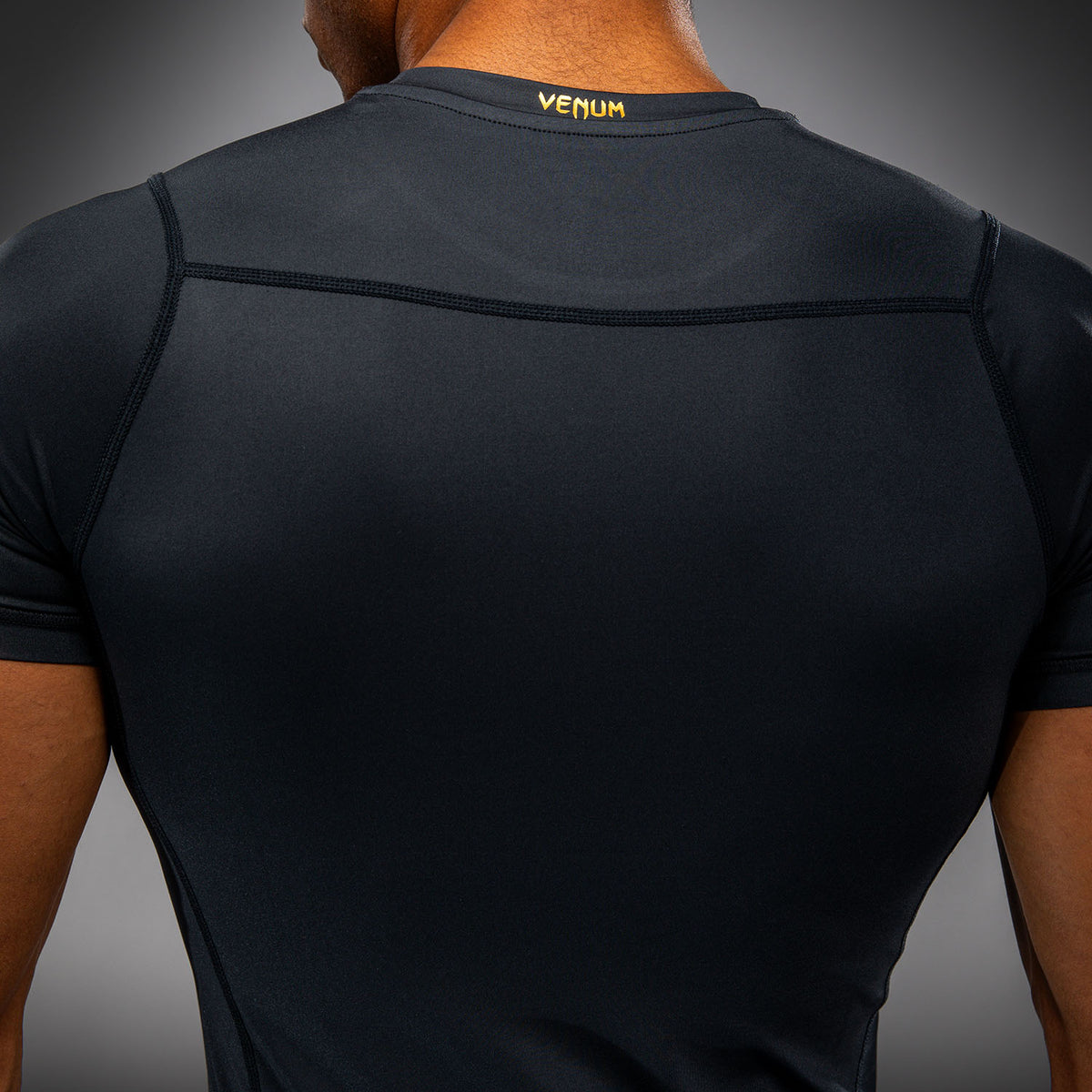 Venum Attack Rashguard a maniche corte - Nero/Oro