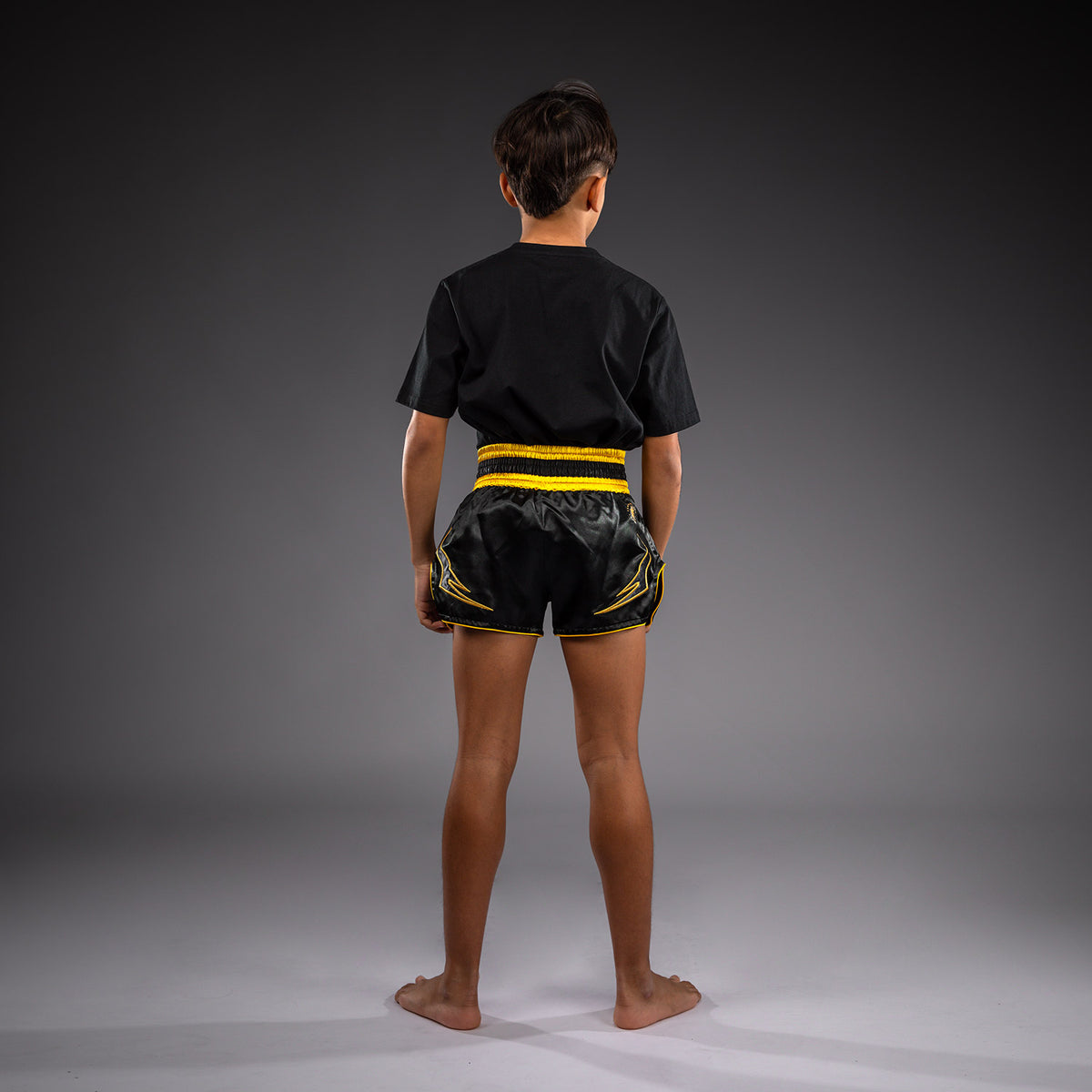 Venum Bangkok Fury Pantaloncini da Muay Thai per bambini - Nero/Oro