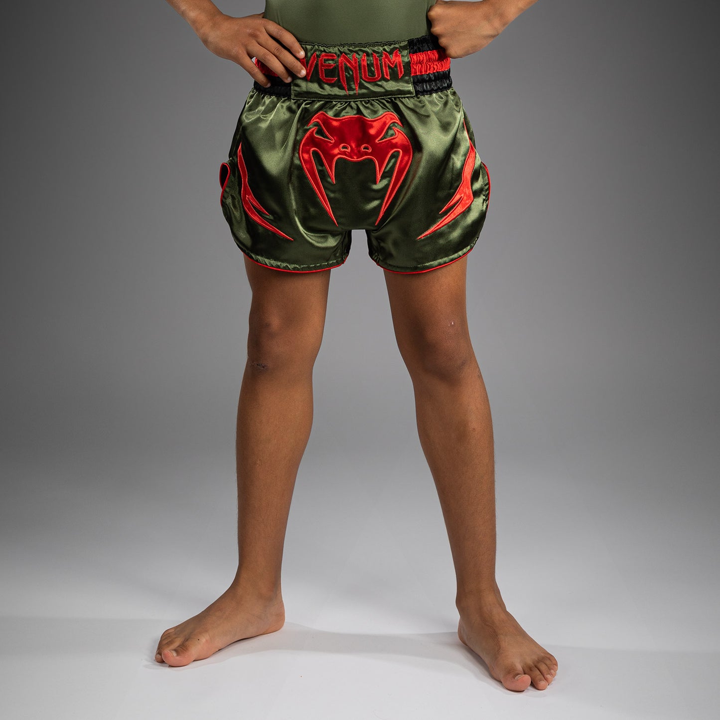 Venum Inferno Pantaloni Muay Thai per Bambini - Verde Militare/Arancione
