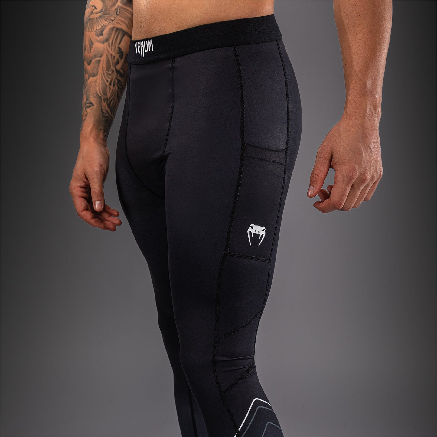 Venum Streamline Spats – Nero/Bianco