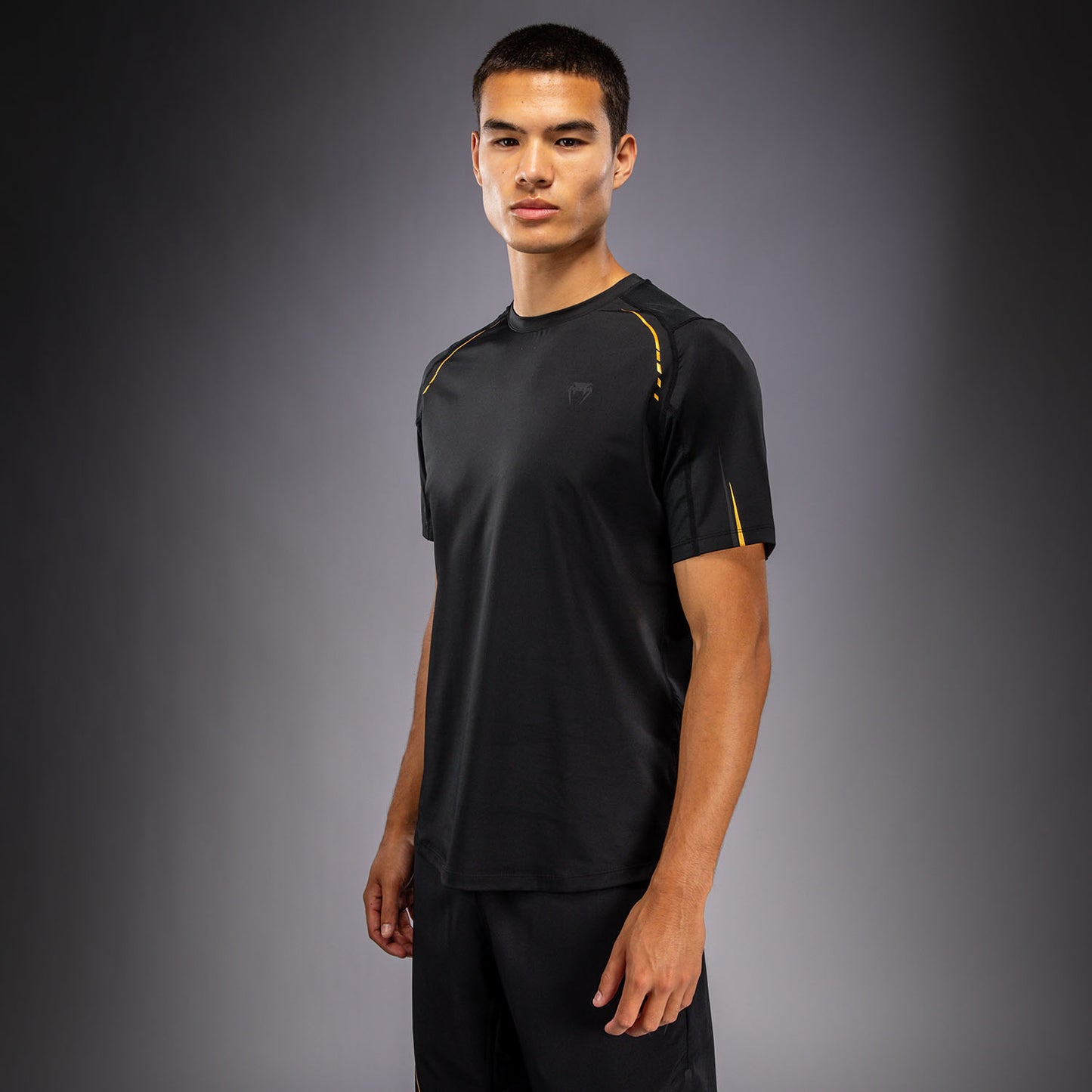 Venum G-Core Maglietta Dry Tech - Nero/Oro