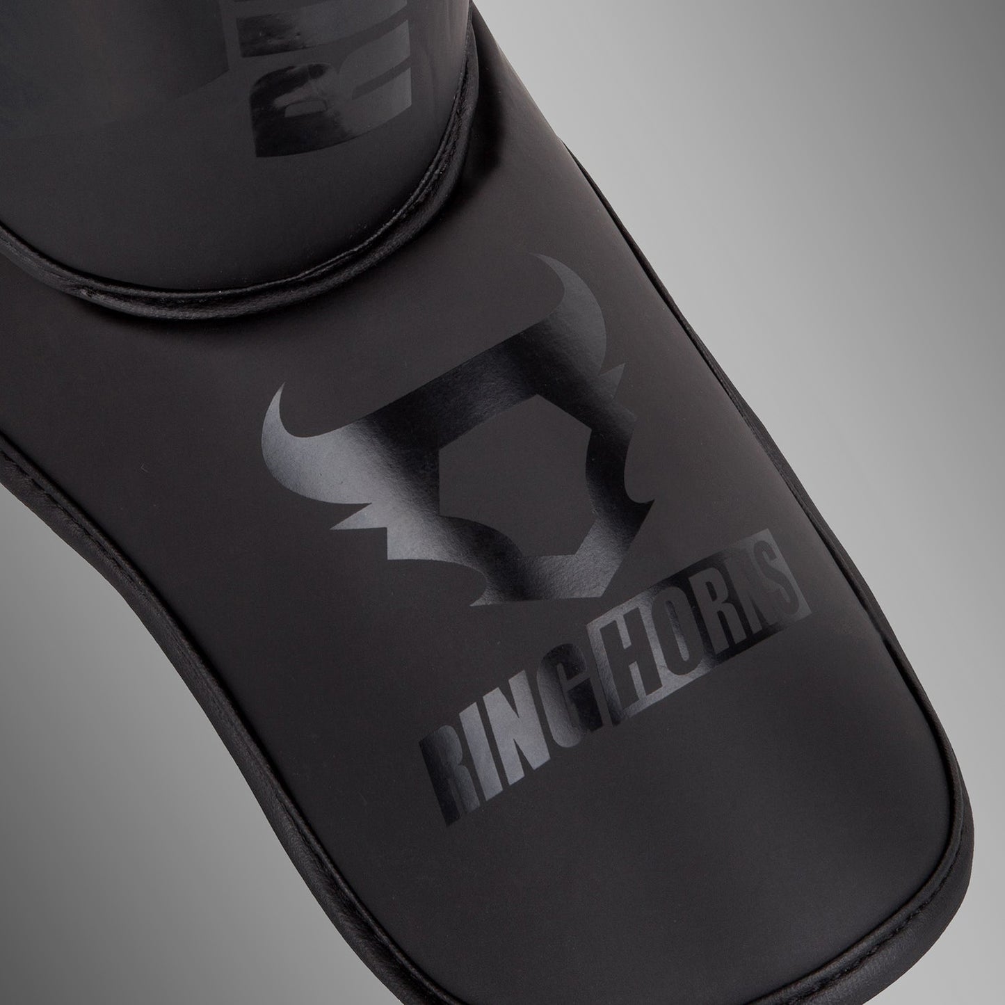 Ringhorns Charger by Venum Shin Guards and Foot Protectors – Nero/Nero