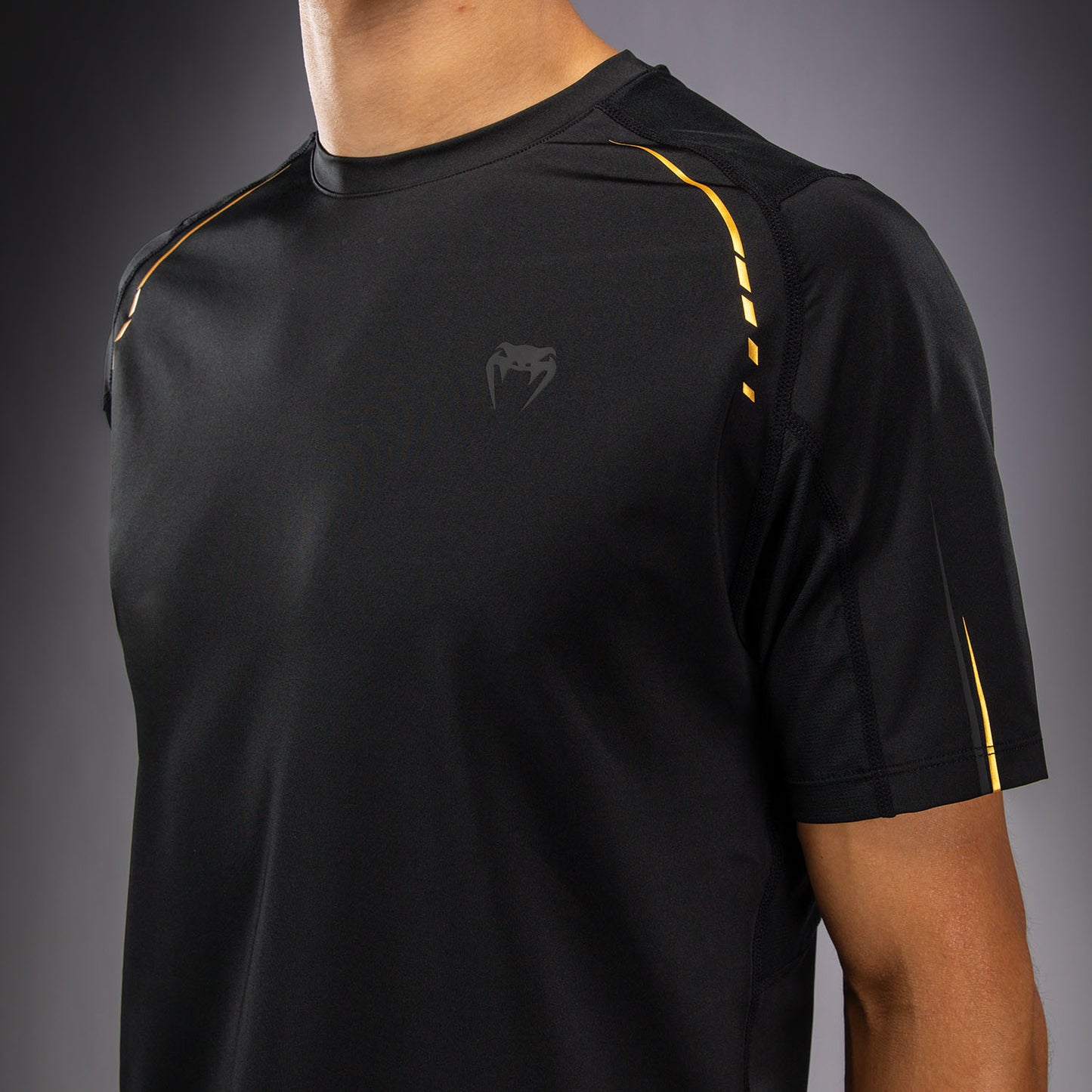 Venum G-Core Maglietta Dry Tech - Nero/Oro